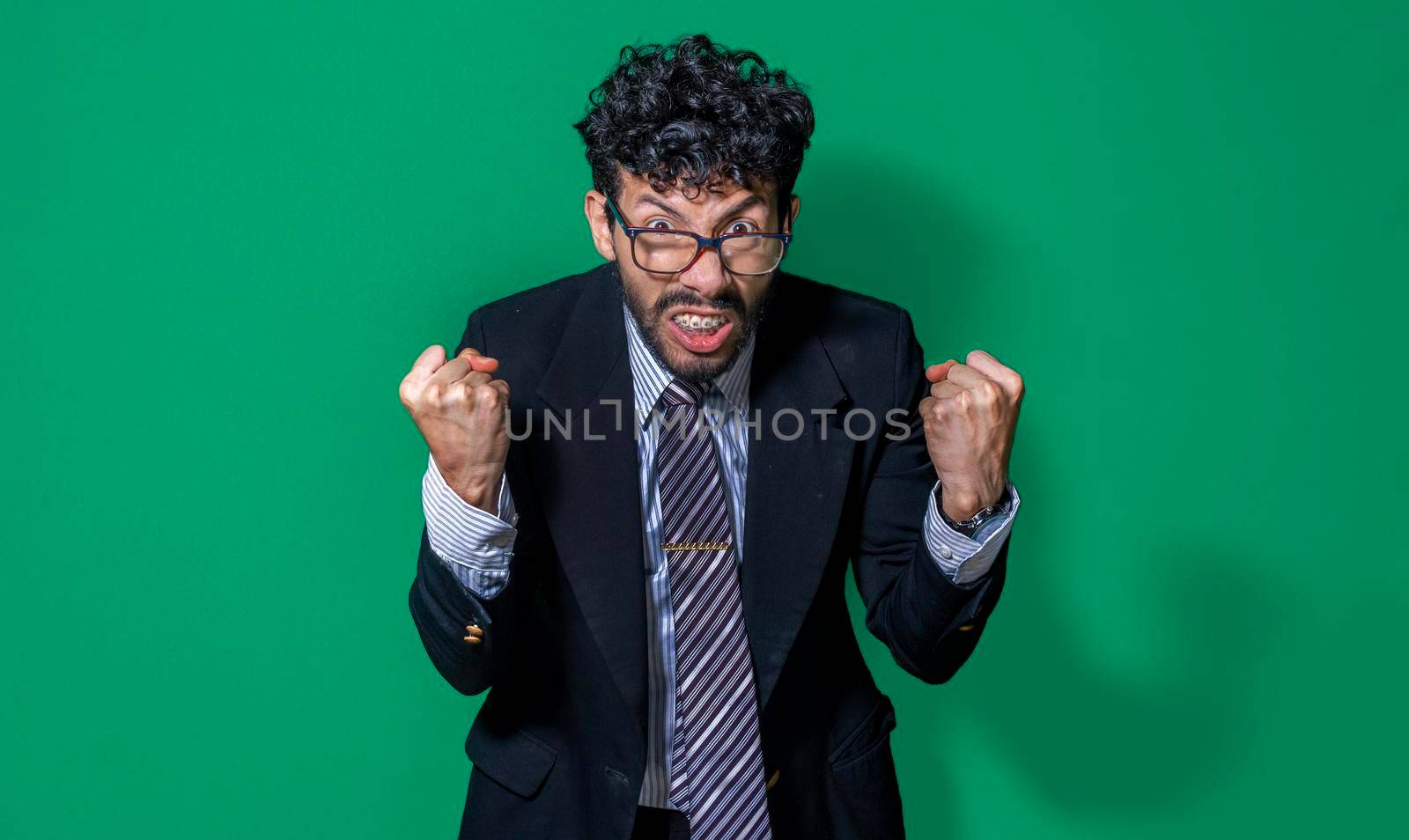 Furious businessman man, angry man concept, frustrated man face by isaiphoto
