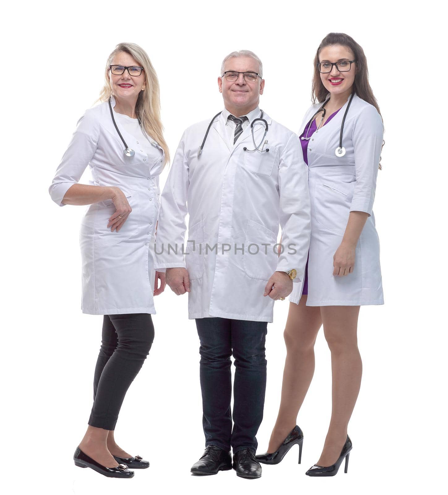 in full growth. group of qualified doctors. isolated on a white background