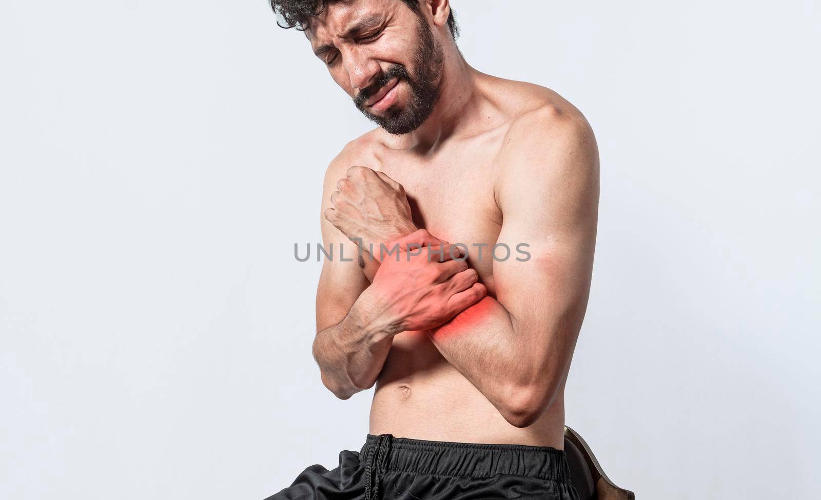 Person with wrist pain isolated, concept of man with pain in the hands, man with arthritis rubbing, person with pain in the wrist, Concept of arthritis in the wrist