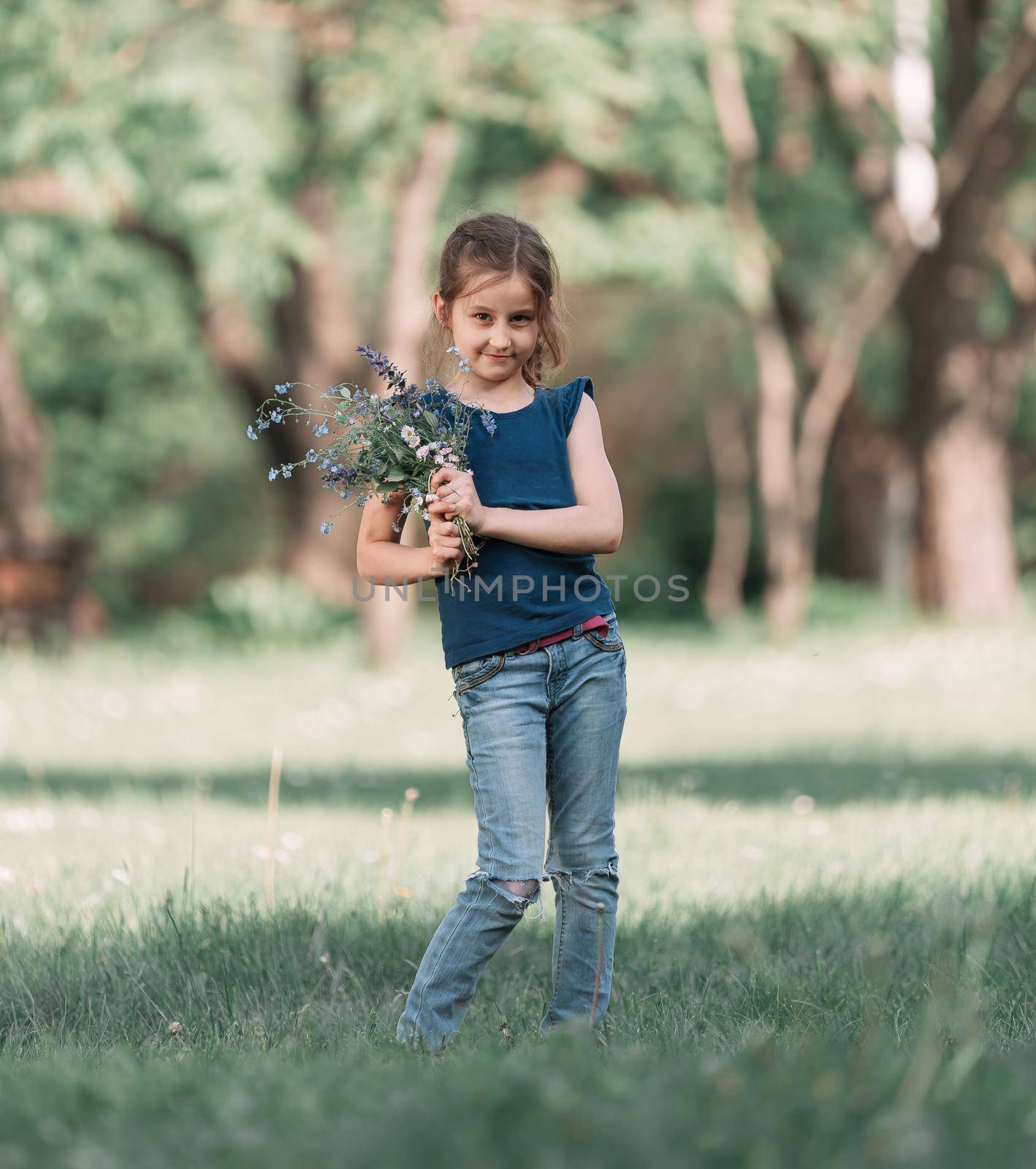little boy takes a picture of his sister in the Park. Hobbies and interests