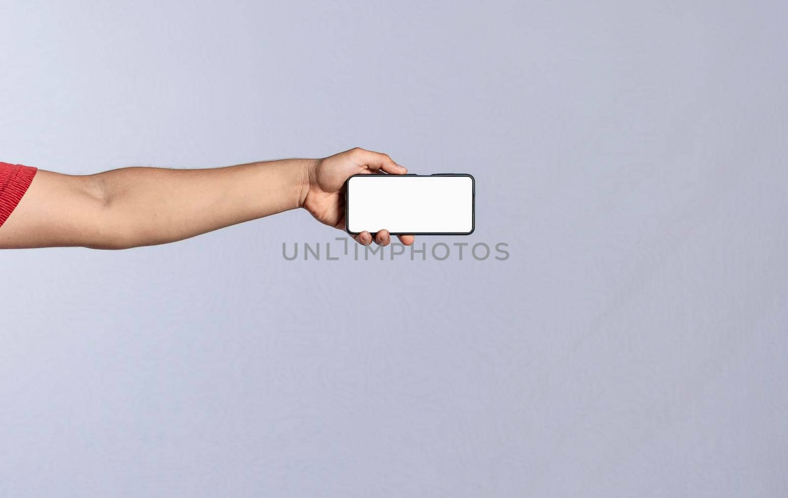 Hand with cell phone isolated, hand showing cell phone isolated, one hand showing cell phone screen isolated by isaiphoto