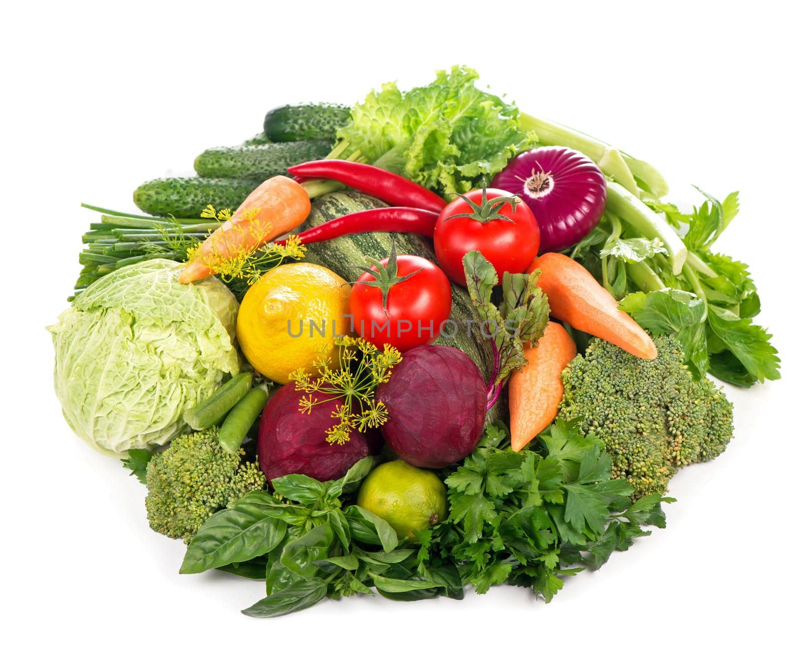 Healthy Eating. Seasonal organic raw vegetables. Isolated over white background