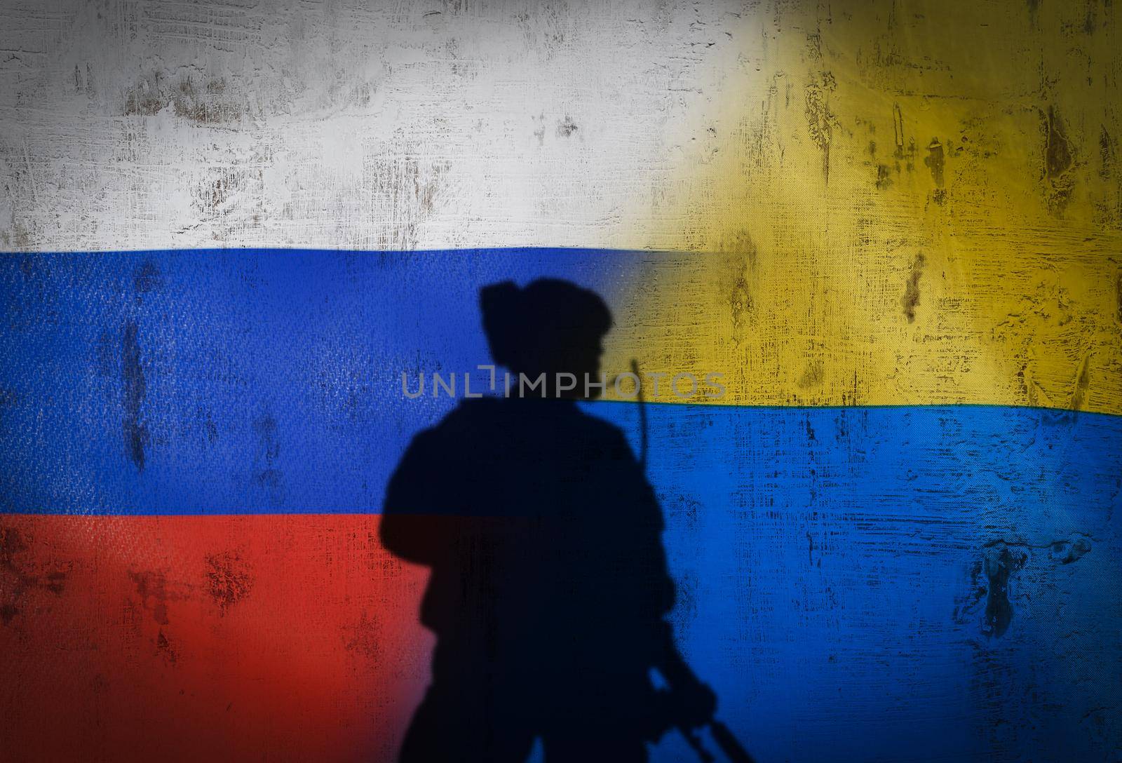 Russia vs Ukraine flag on cracked wall, concept of war between russia and ukraine, silhouette of soldiers on russia vs ukraine flag