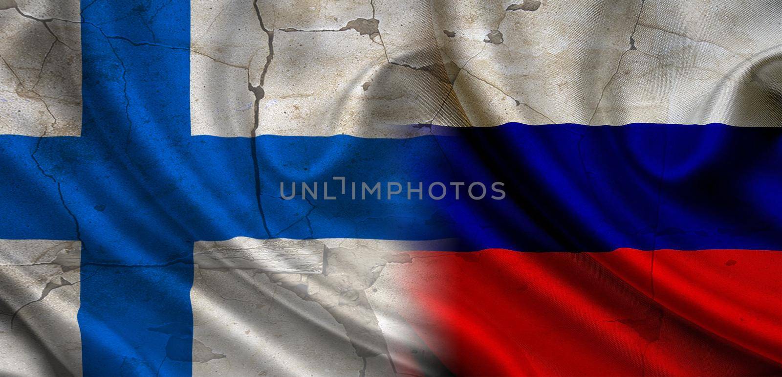 Flag of Russia vs Finland, concept of confrontation between Russia and Finland, cracked wall with flag of russia and finland, confrontation between russia vs finland by isaiphoto
