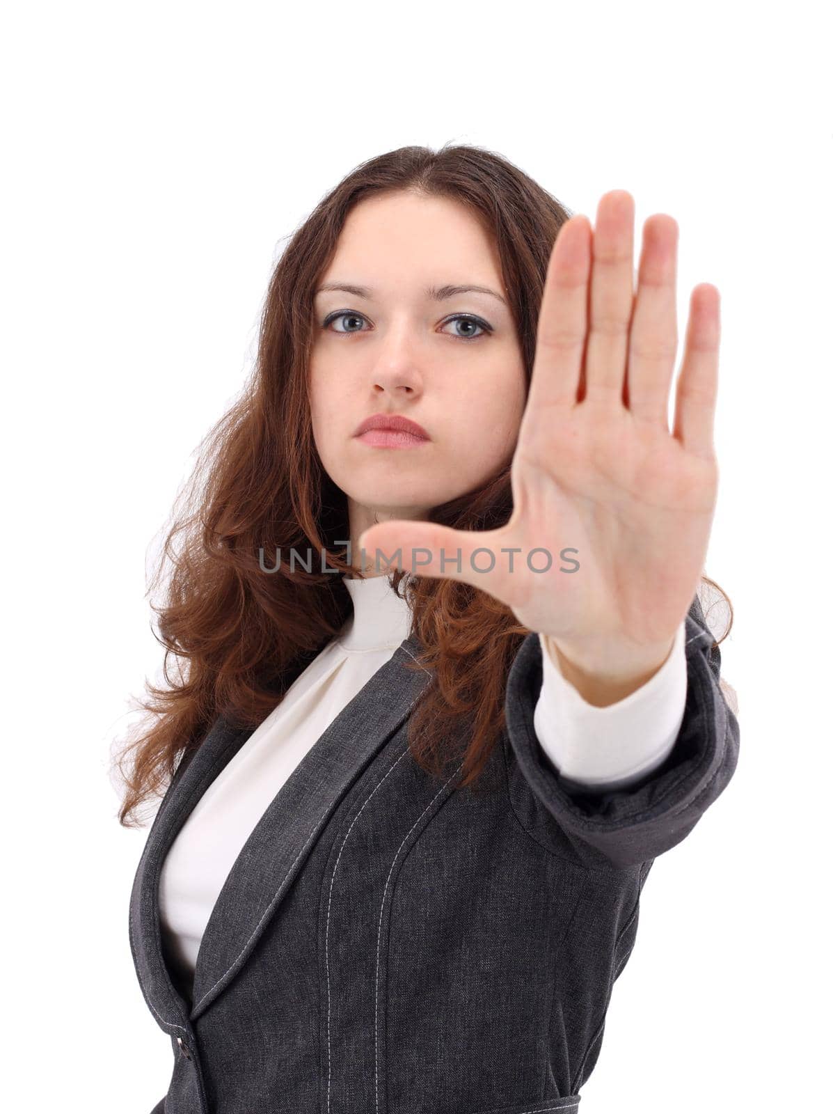 Serious businesswoman making stop sign on white background, focus on business woman. by SmartPhotoLab