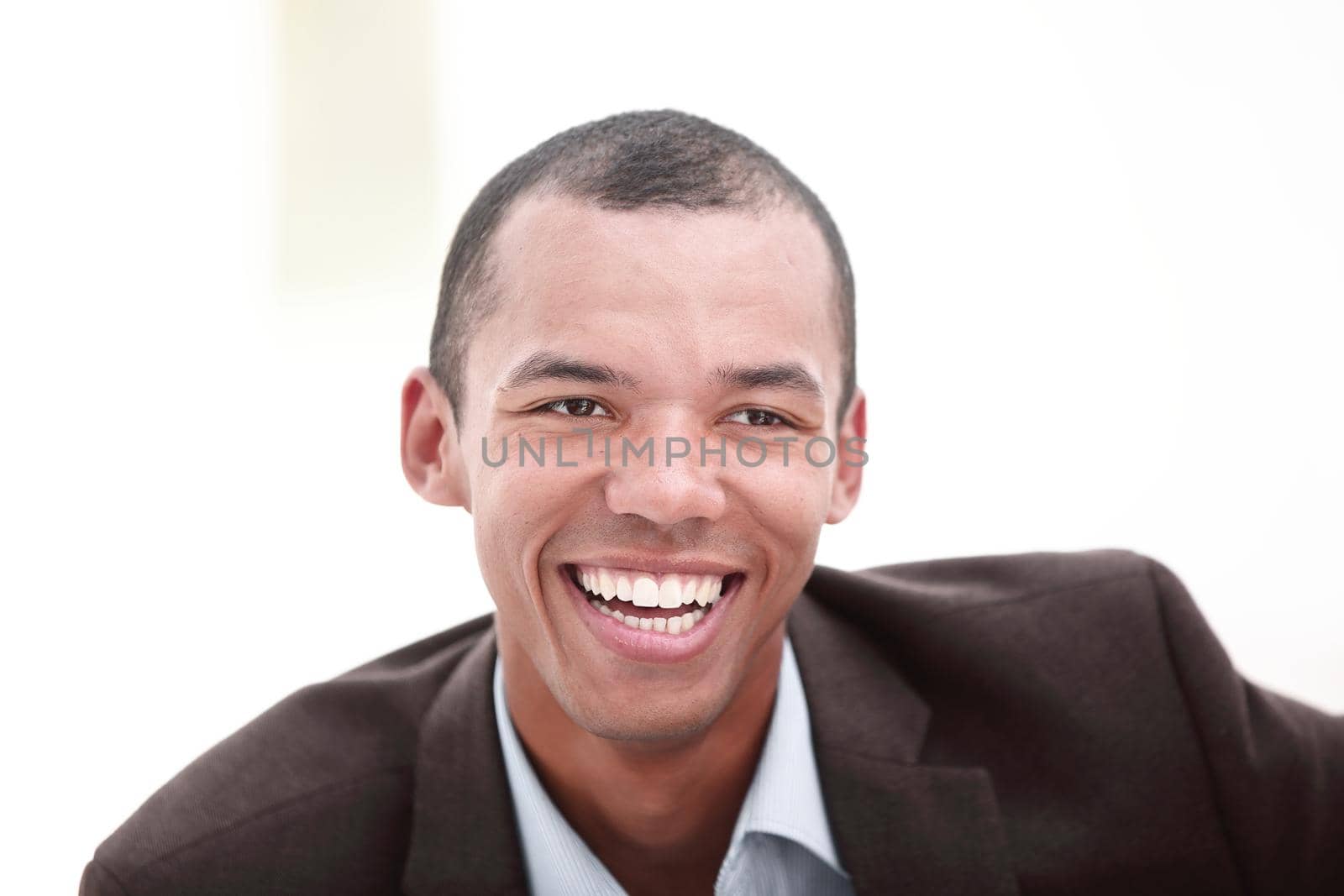 closeup.portrait of a young businessman on a light background.photo with copy space