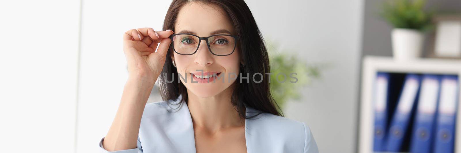 Smiling female in luxury costume by kuprevich