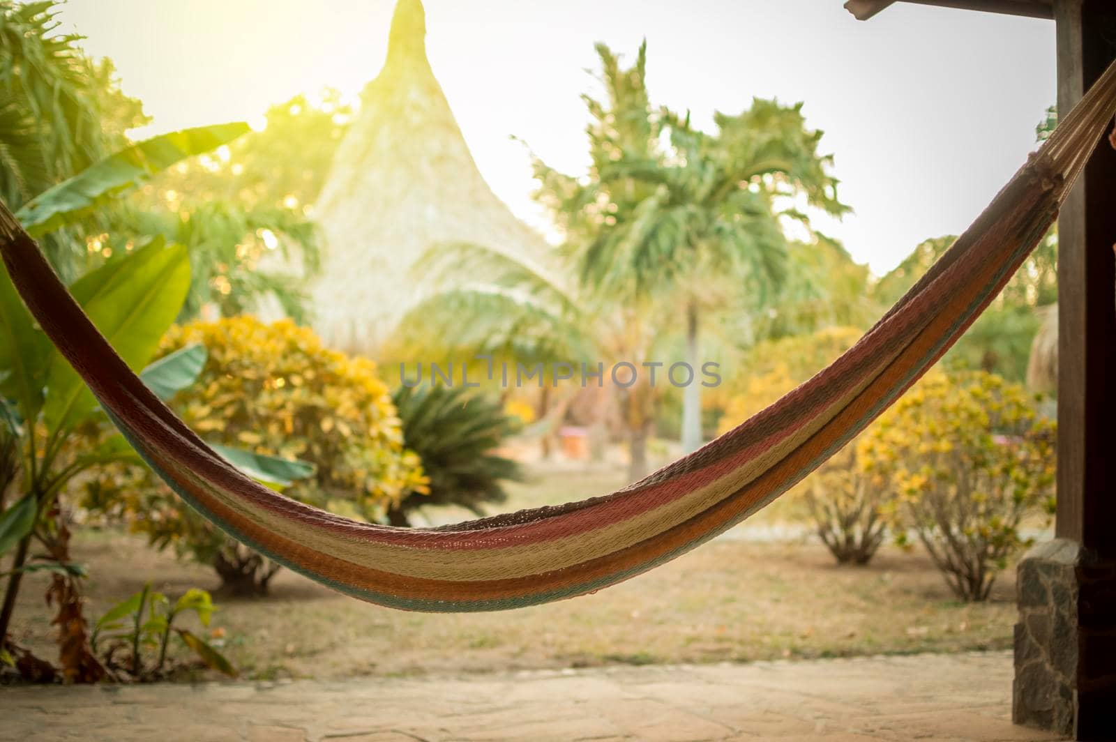 Beach hammock with copy space, hammock in a beach hut, Concept of TRANQUILITY IN VACATION by isaiphoto