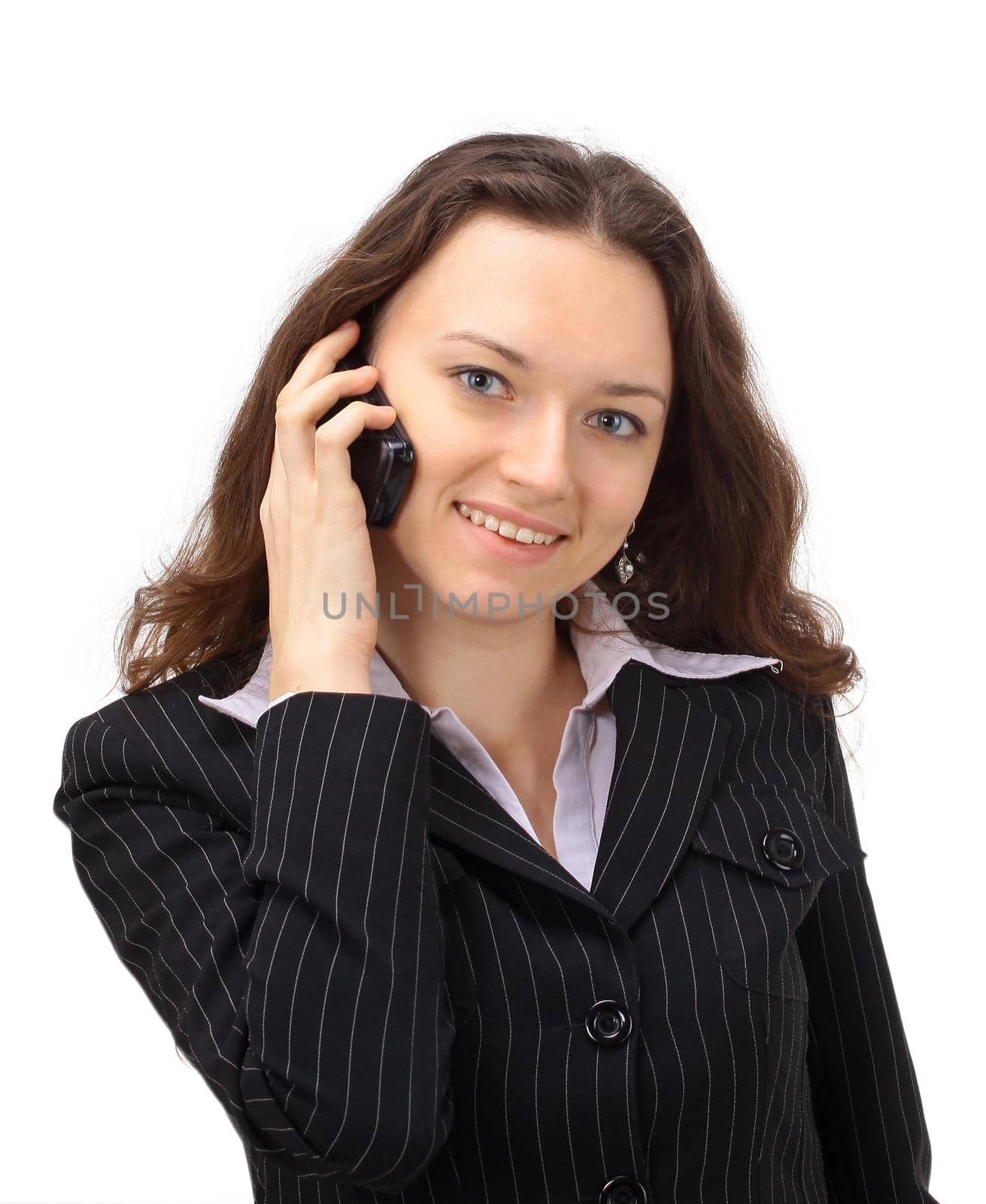 The beautiful business woman ðàçãîâàðèâàíò on the phone on a white background