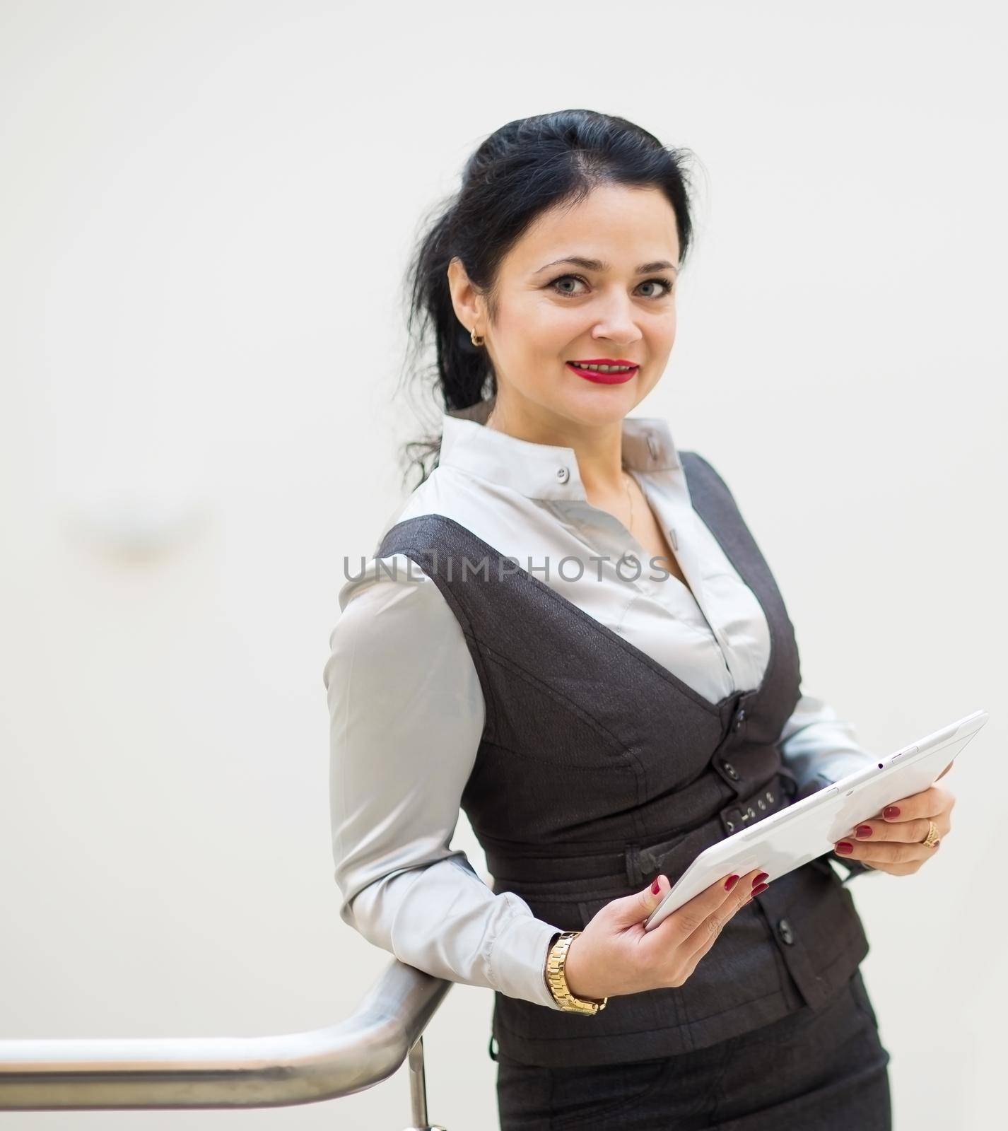 Portrait of a business woman on a good working day by SmartPhotoLab