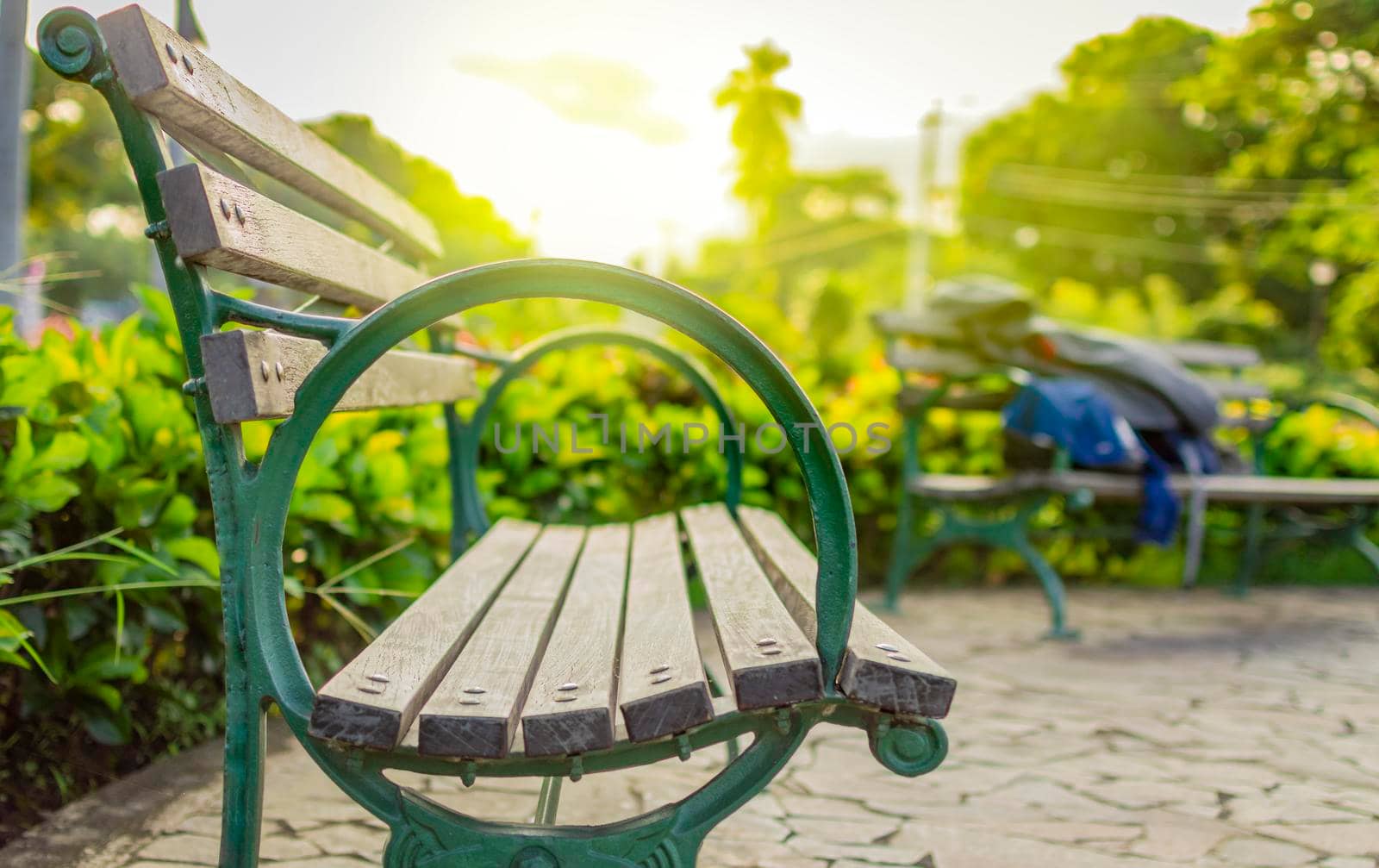 Close up of a bench in a park, A wooden bench in the park, wooden bench with unfocused background