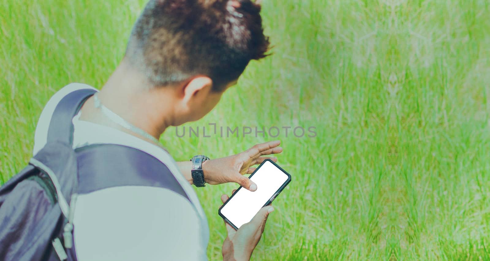 Close up of a man with cell phone in hand, close up shot of a person checking his cell phone, young guy with cell phone in hand with copy space