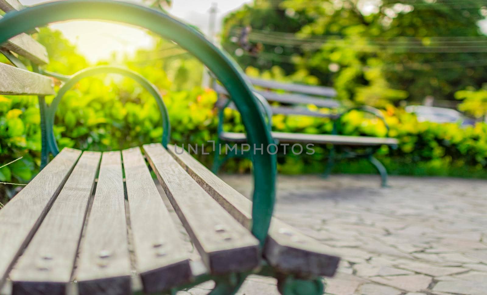 Close up of a bench in a park, A wooden bench in the park, wooden bench with unfocused background