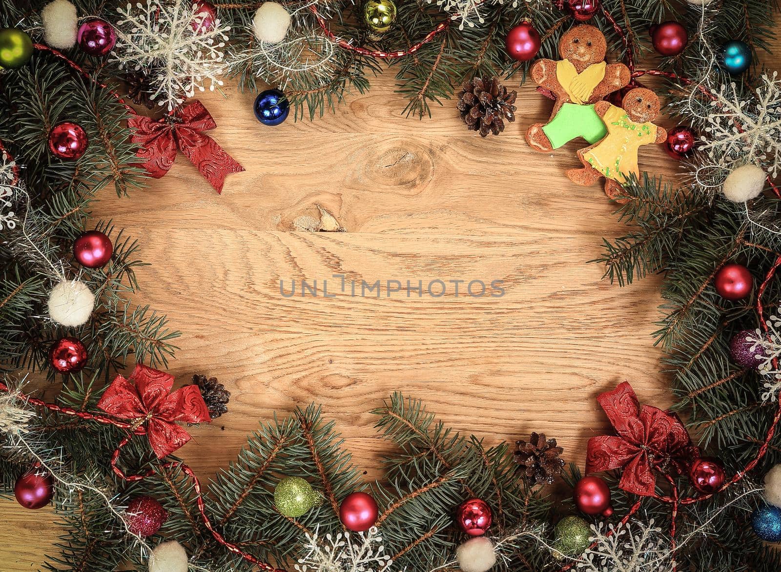 beautifully decorated Christmas wreath on wooden background .photo with place for text .