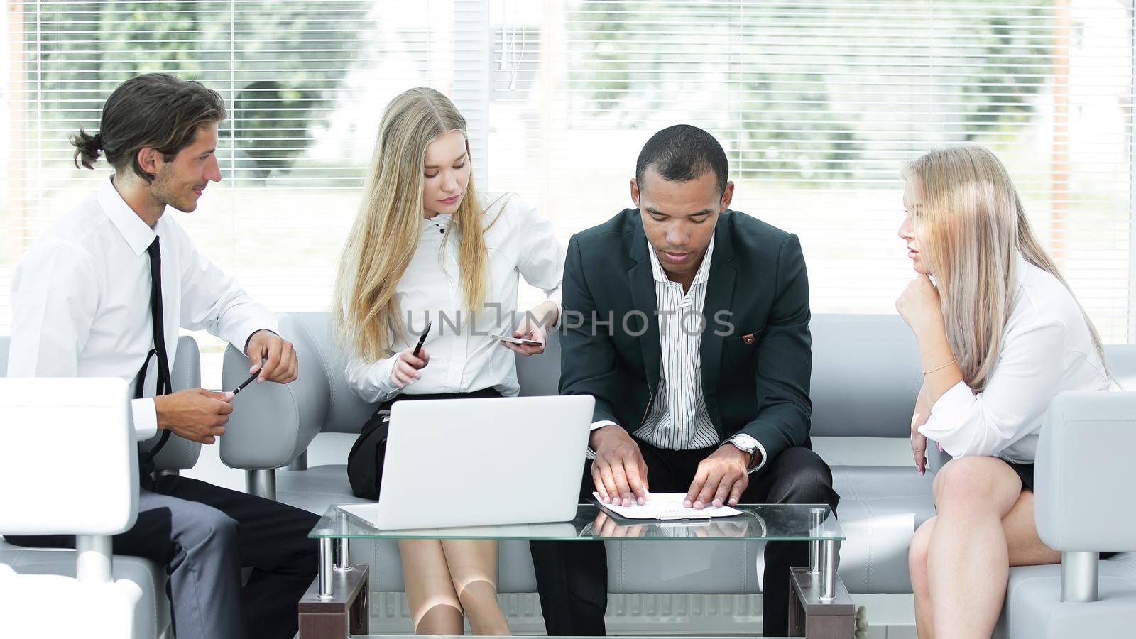 concentrated business team at the workplace thinking about business problems .photo with copy space