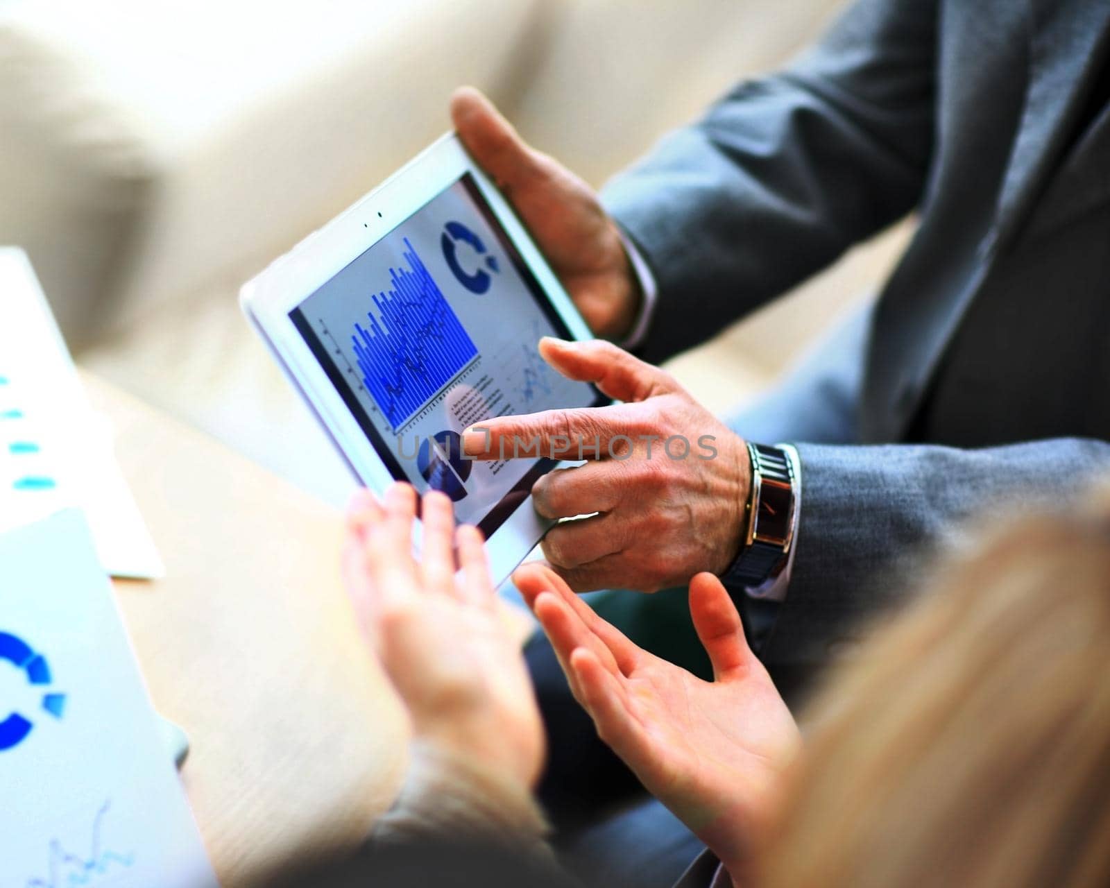 man holding digital tablet, closeup