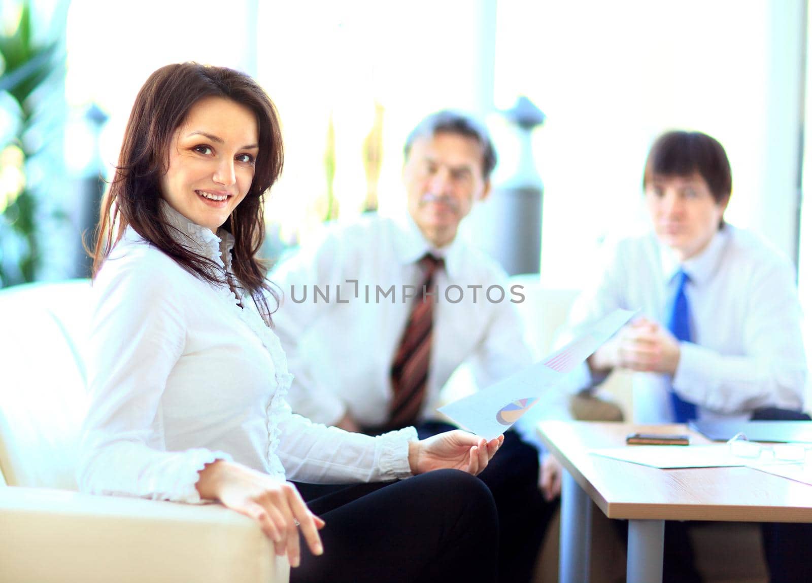 Successful business woman looking confident and smiling