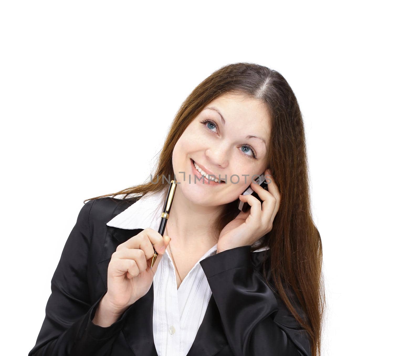 female assistant talking on cell sitting at her Desk.photo with copy space