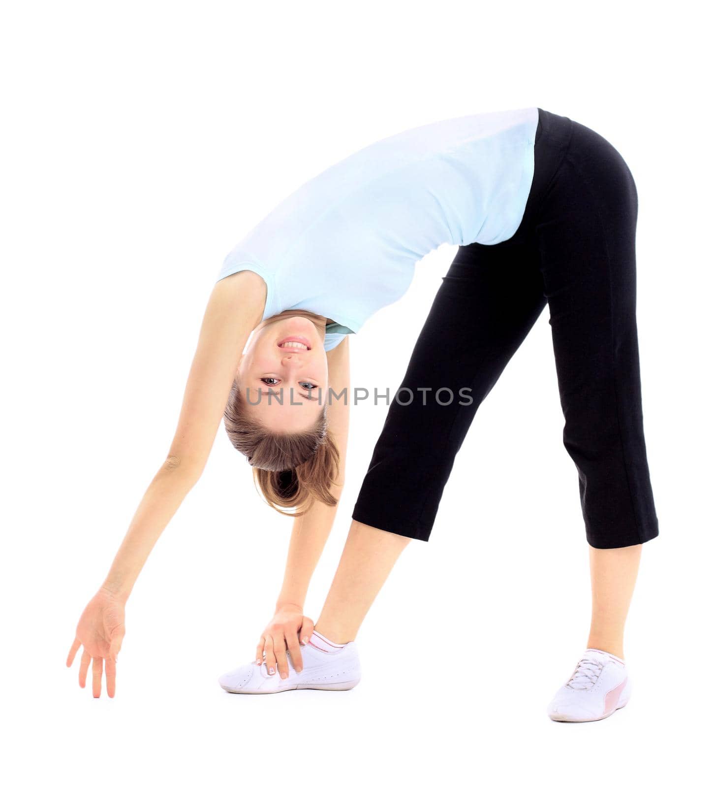 The beautiful young woman plays sports on a white background