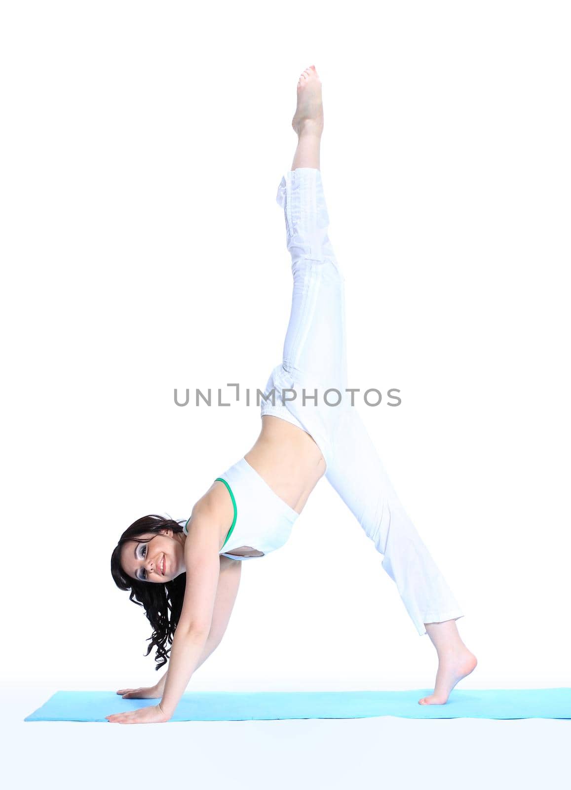 young woman in yoga pose on isolated white background