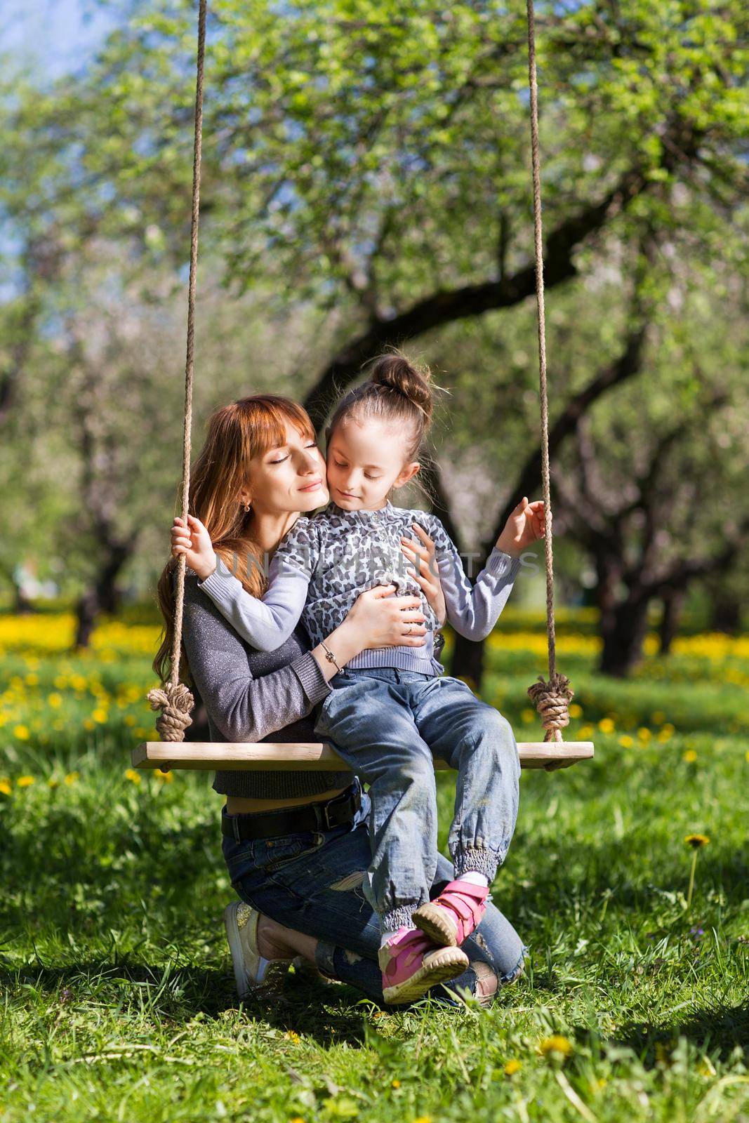 Riendly, cheerful family having a picnic.