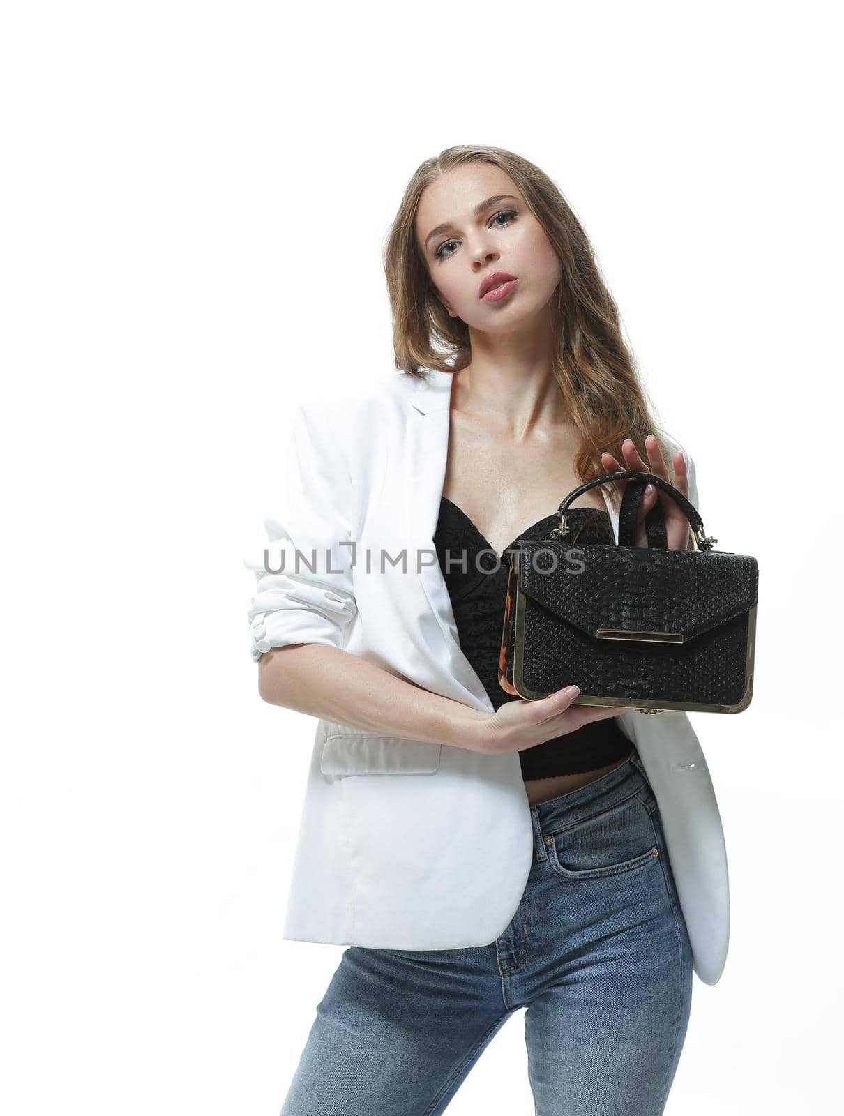 stylish young woman with fashionable handbag.isolated on white.