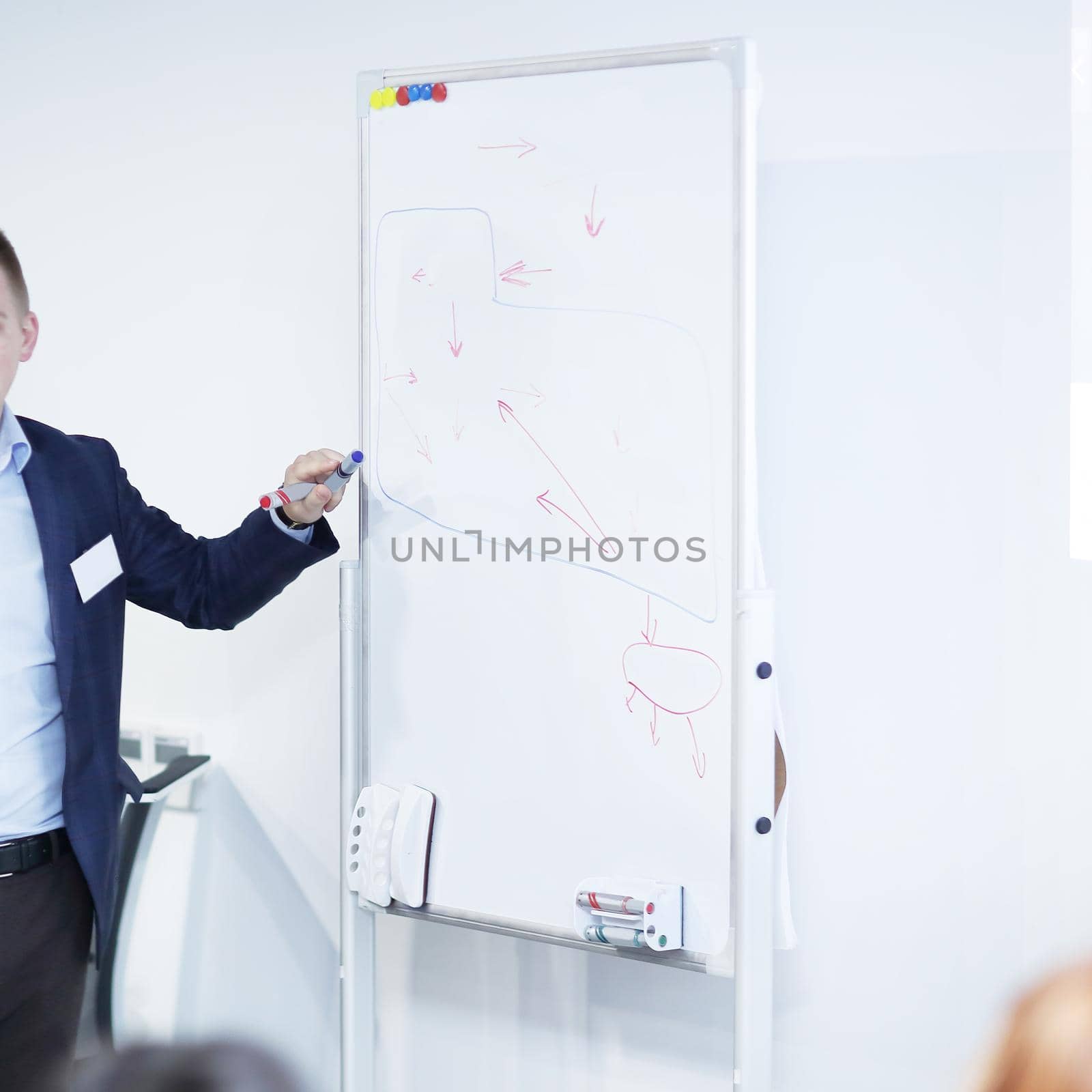 close up.businessman writes a marker on the Board by SmartPhotoLab