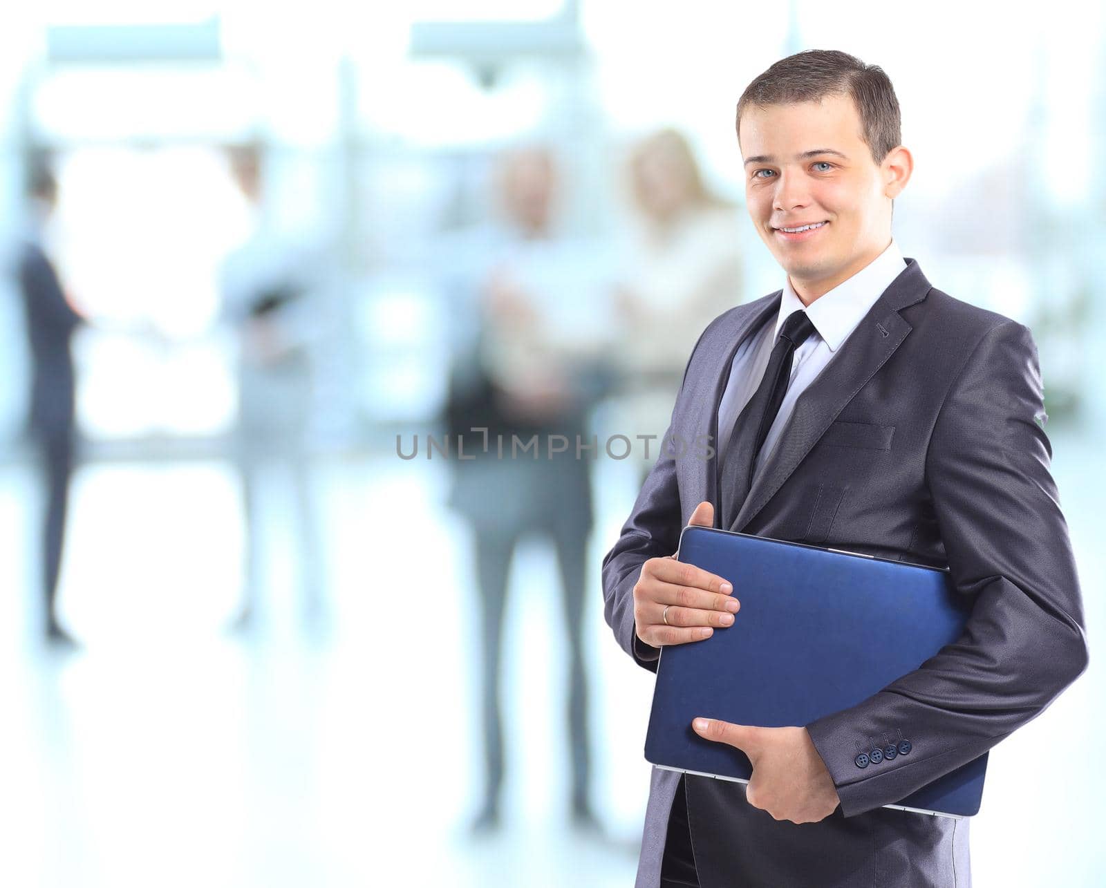 Businessman with a laptop.