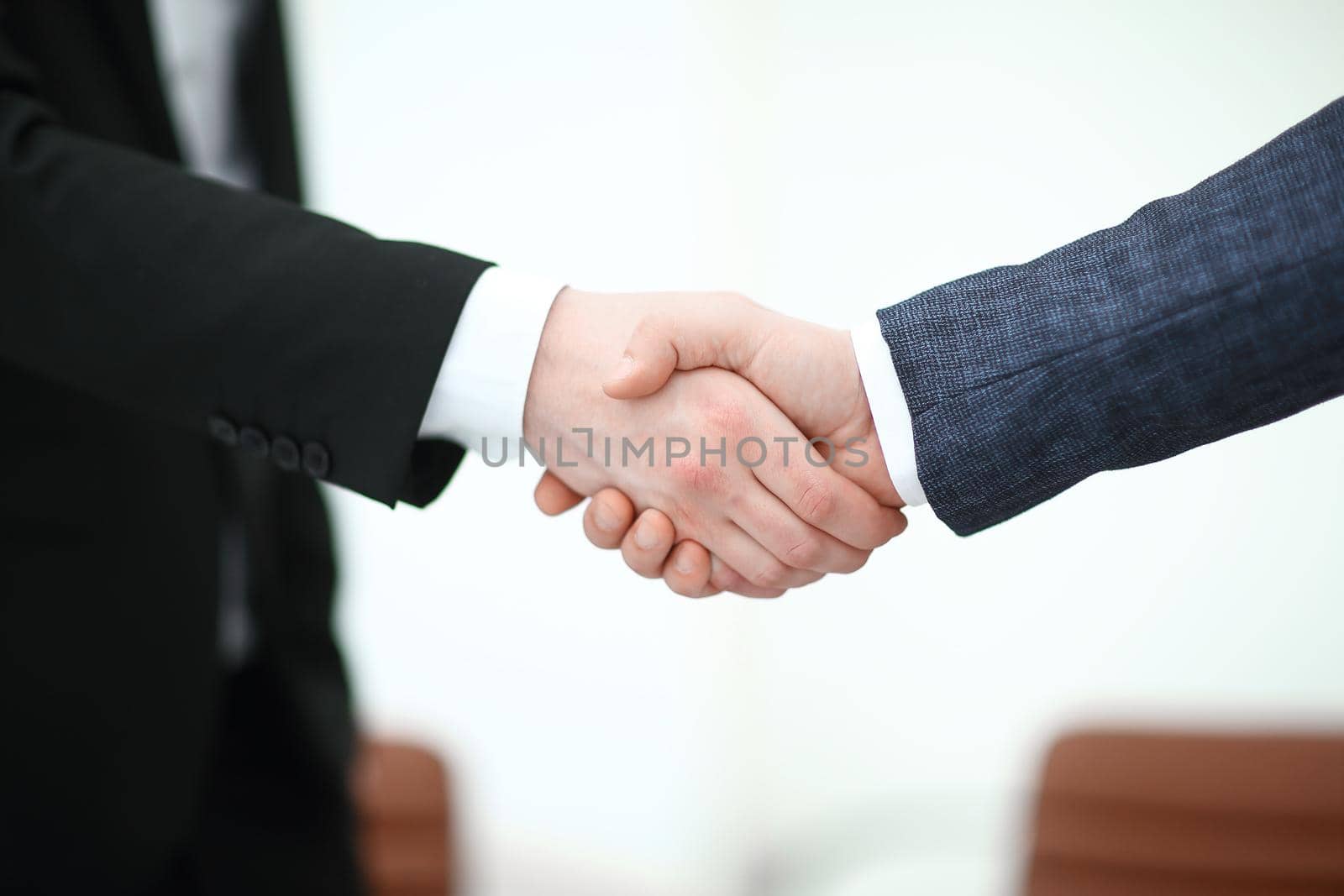 close up.handshake of business partners in the office.