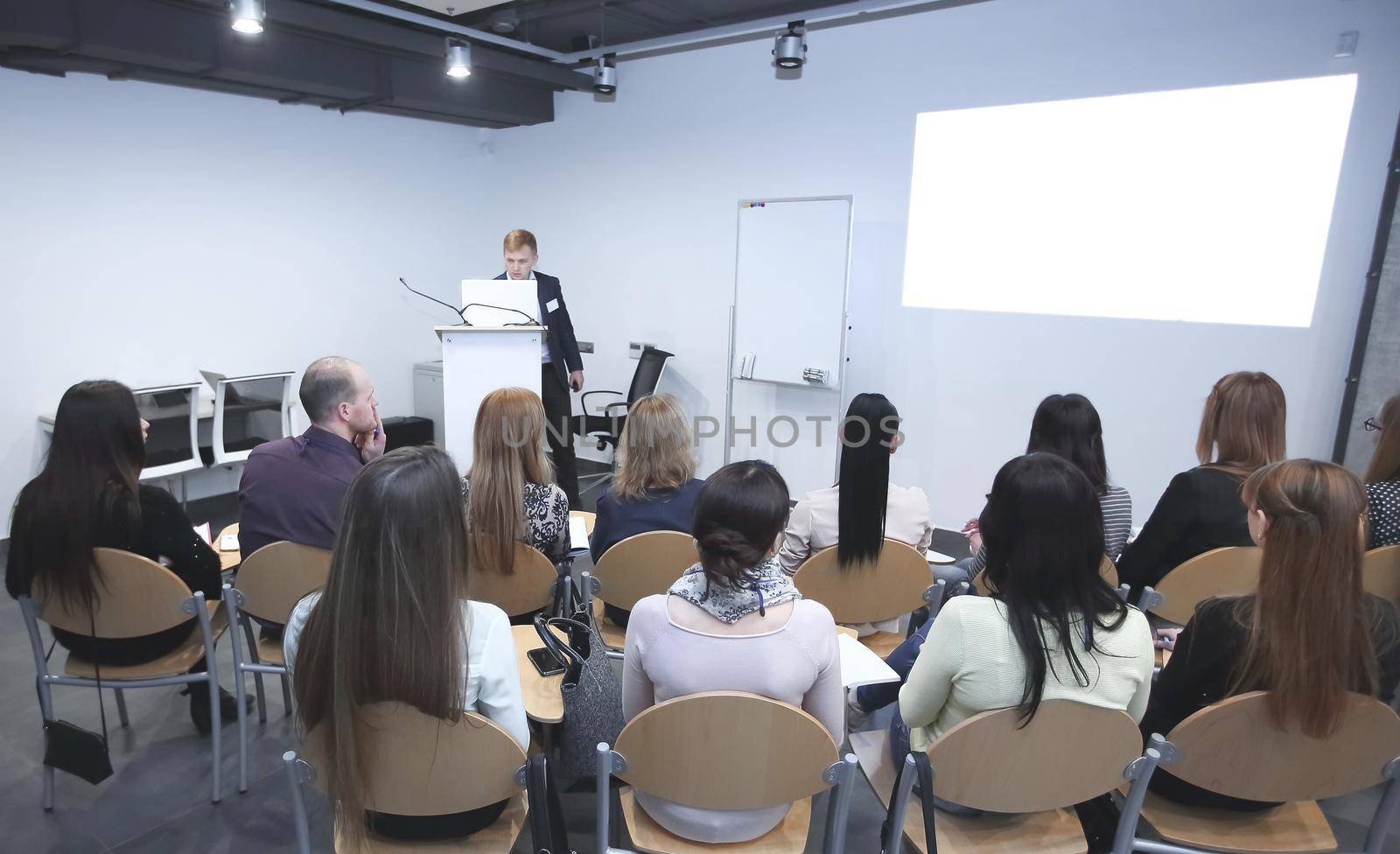 Manager makes a presentation to his business team.business concept