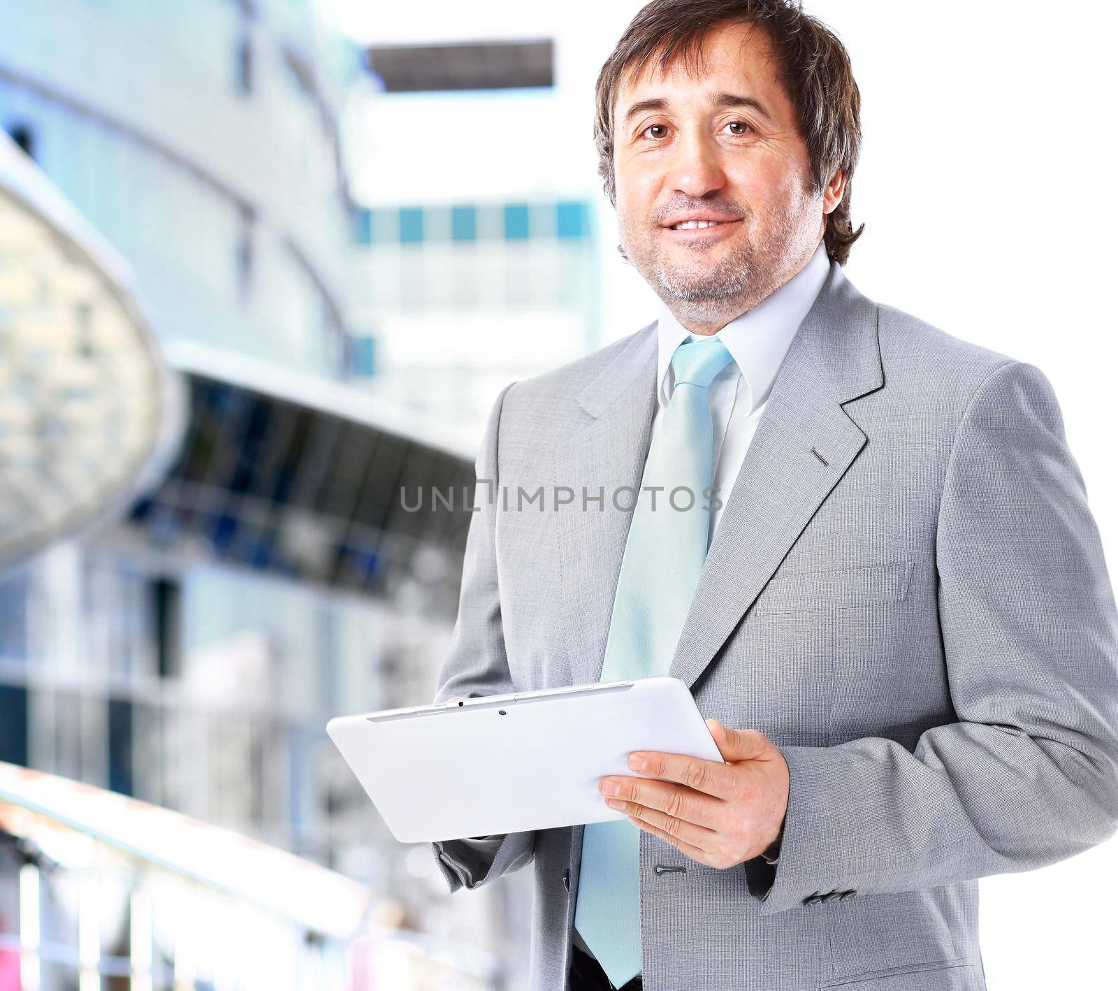 Portrait of a smiling handsome businessman