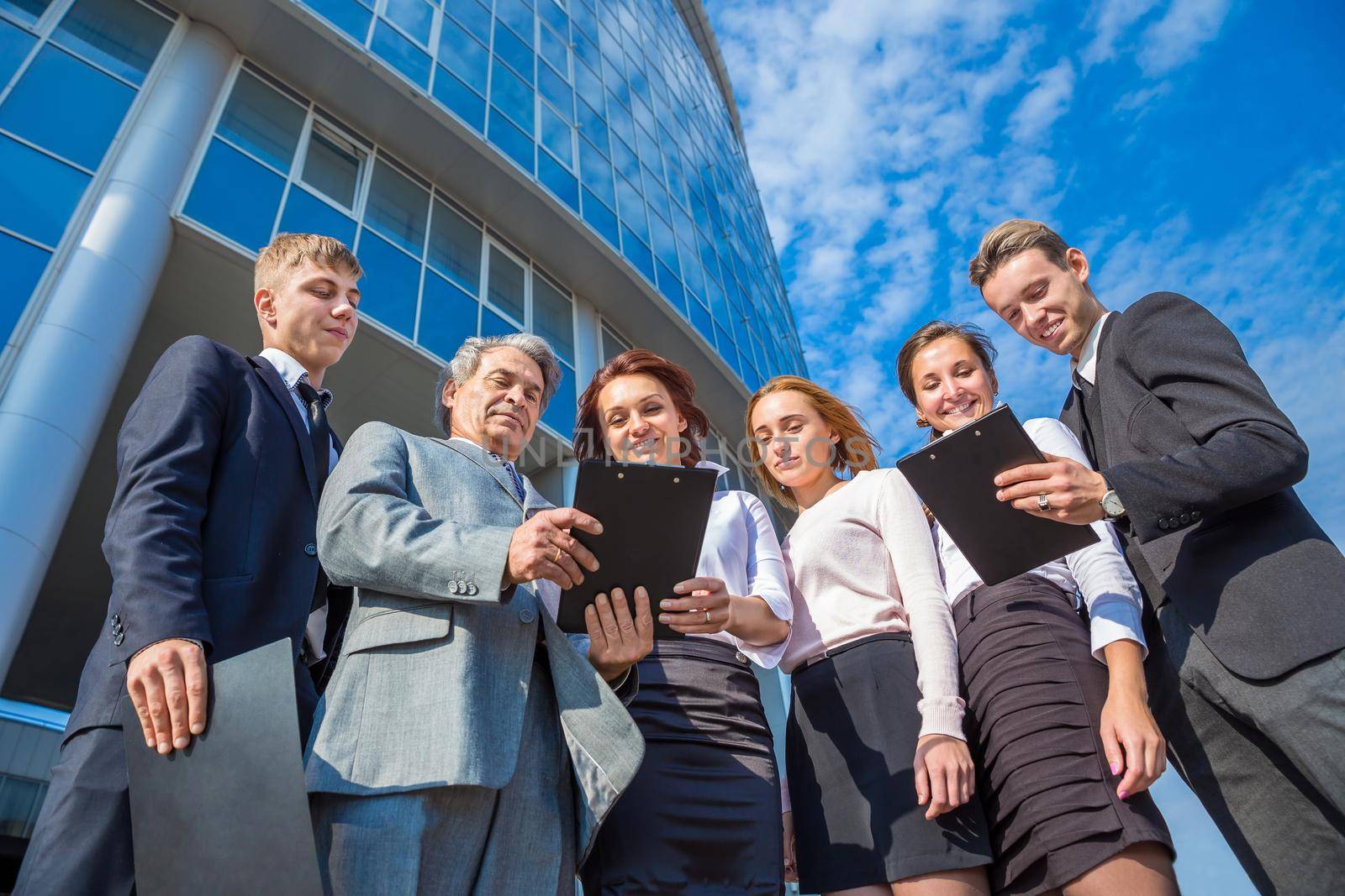 successful business team with tablets on a background of office