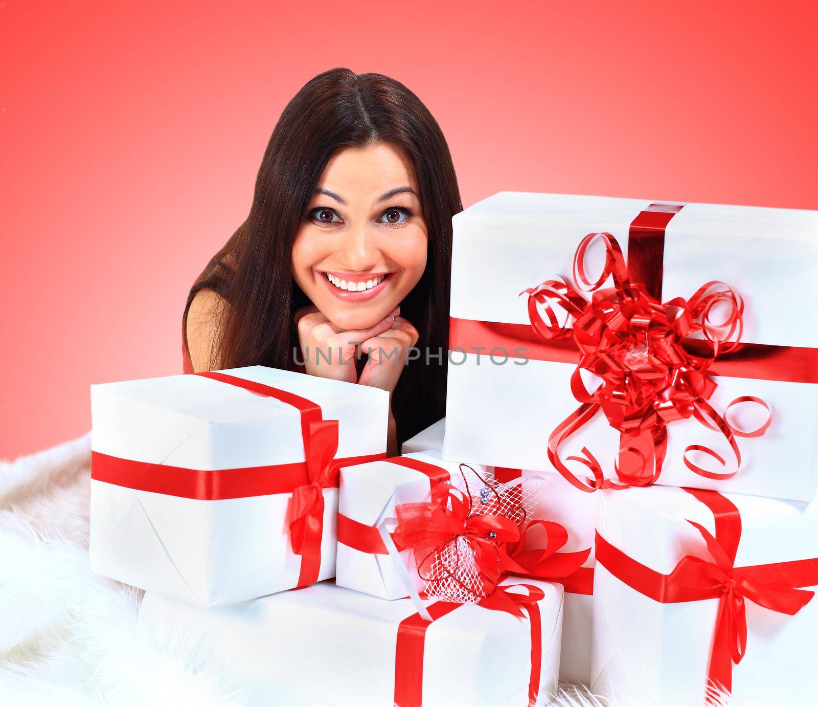Young happy woman with a gift