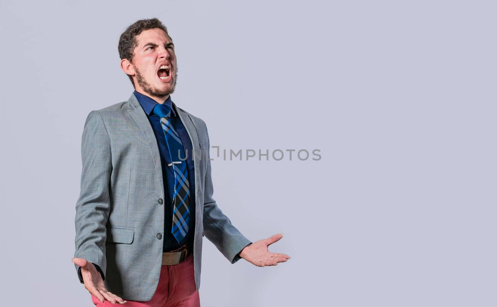 Man in suit screaming loud, Desperate man yelling over isolated background, Business man frustrated yelling