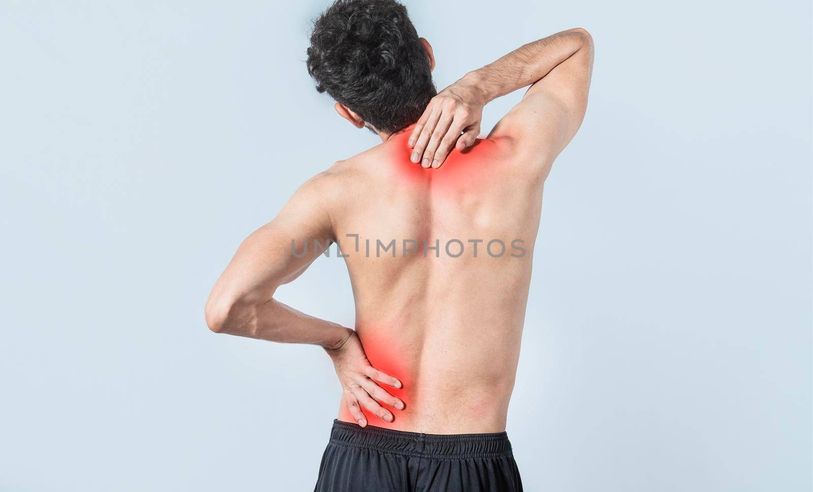 Neck and back pain concept, man with neck and back muscle pain, Close up of man with neck and back pain, a man with muscle pain on isolated background.