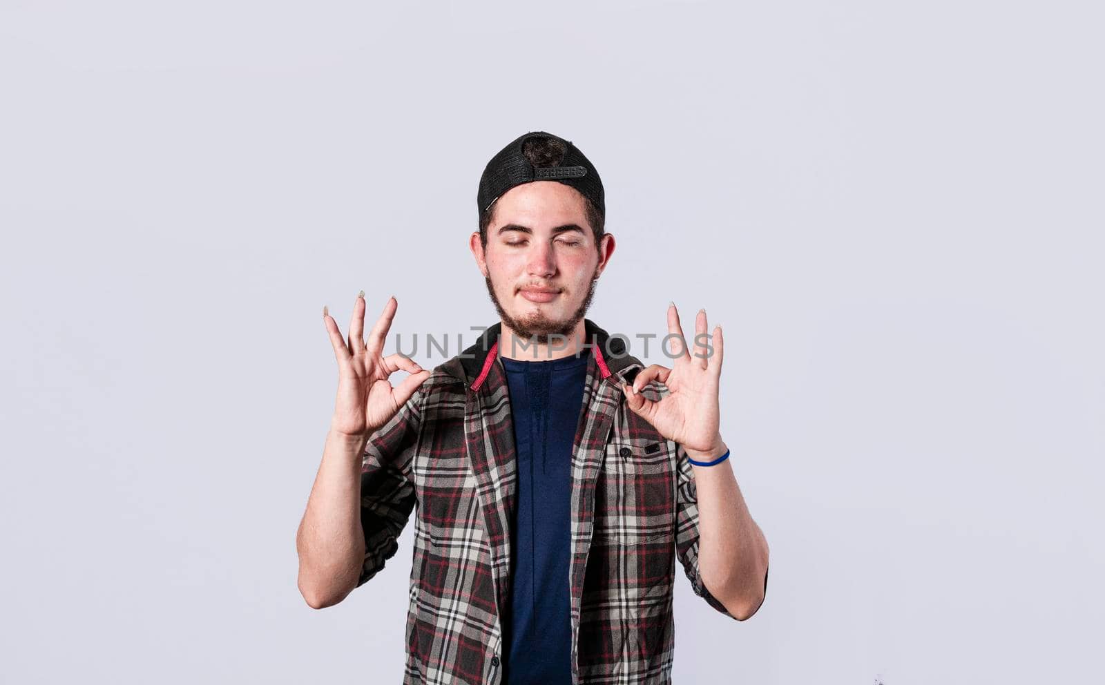 Concept of no problem, young man making ok gesture, expression of everything is fine.