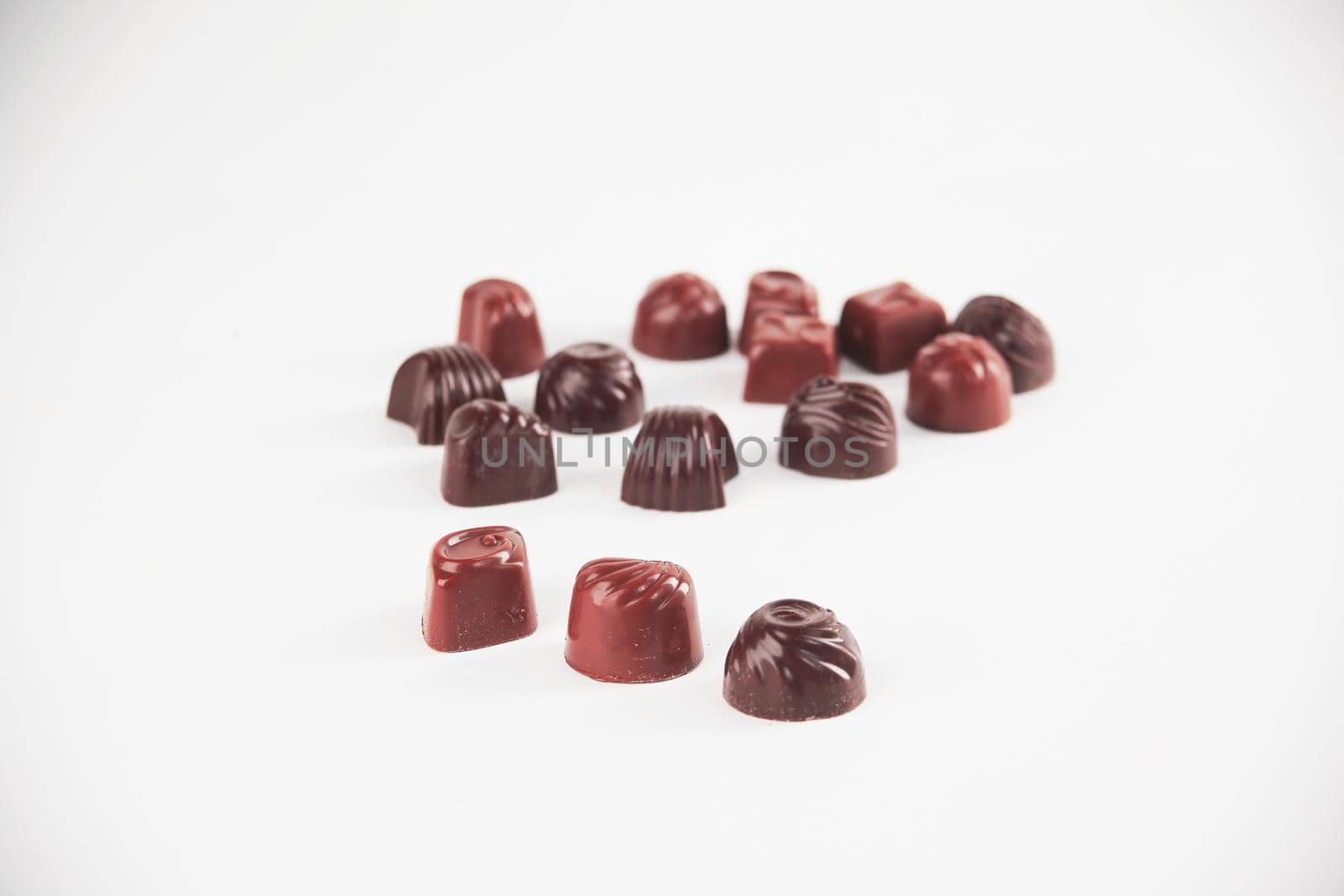 close up.set of chocolates isolated on white.photo with copy space.