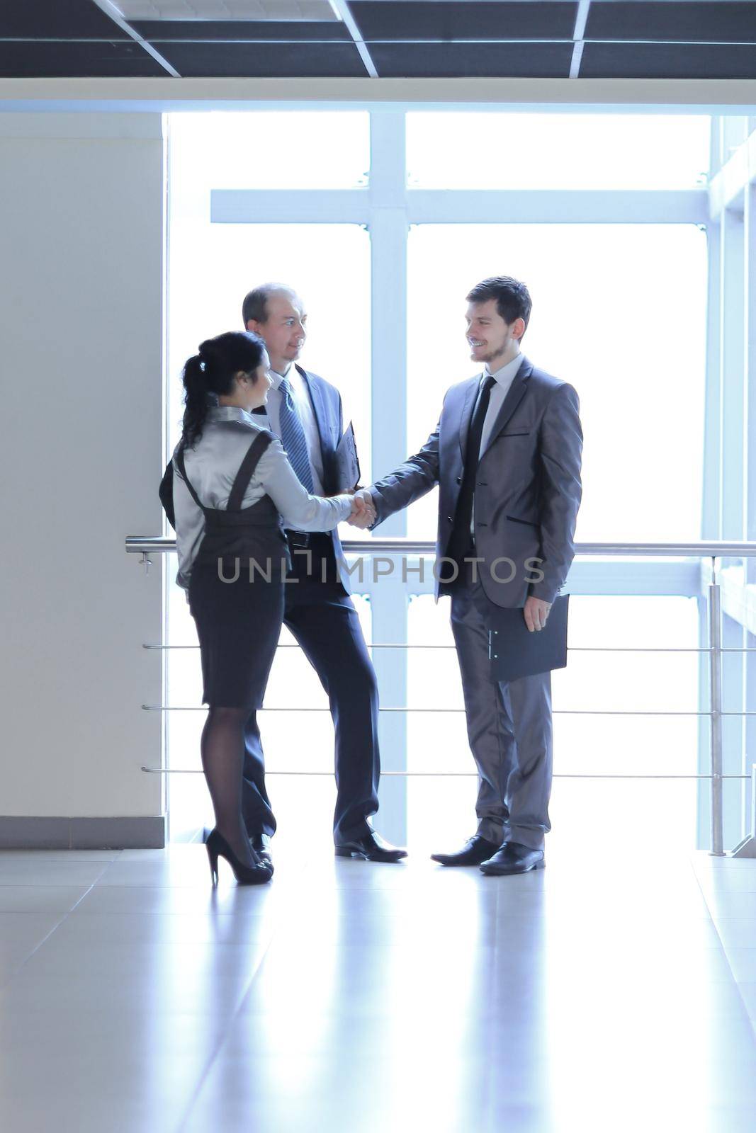 Manager welcomes the client in the lobby office.photo with copy space