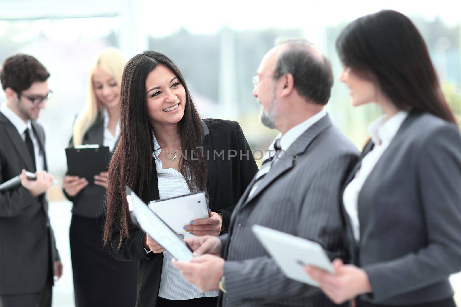 close up.group of business people preparing to start a business meeting.business concept