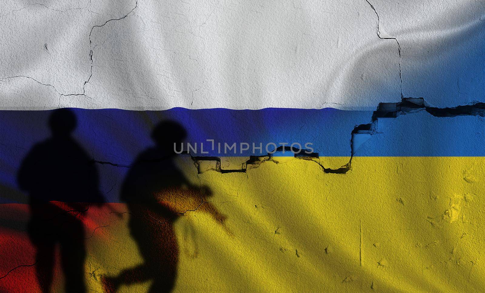 Russia vs Ukraine flag on cracked wall, concept of war between russia and ukraine, silhouette of soldiers on russia vs ukraine flag by isaiphoto