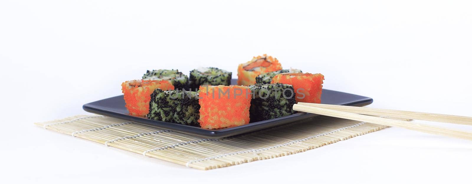 Sushi Set - different types of Maki sushi and chopsticks on a b by SmartPhotoLab