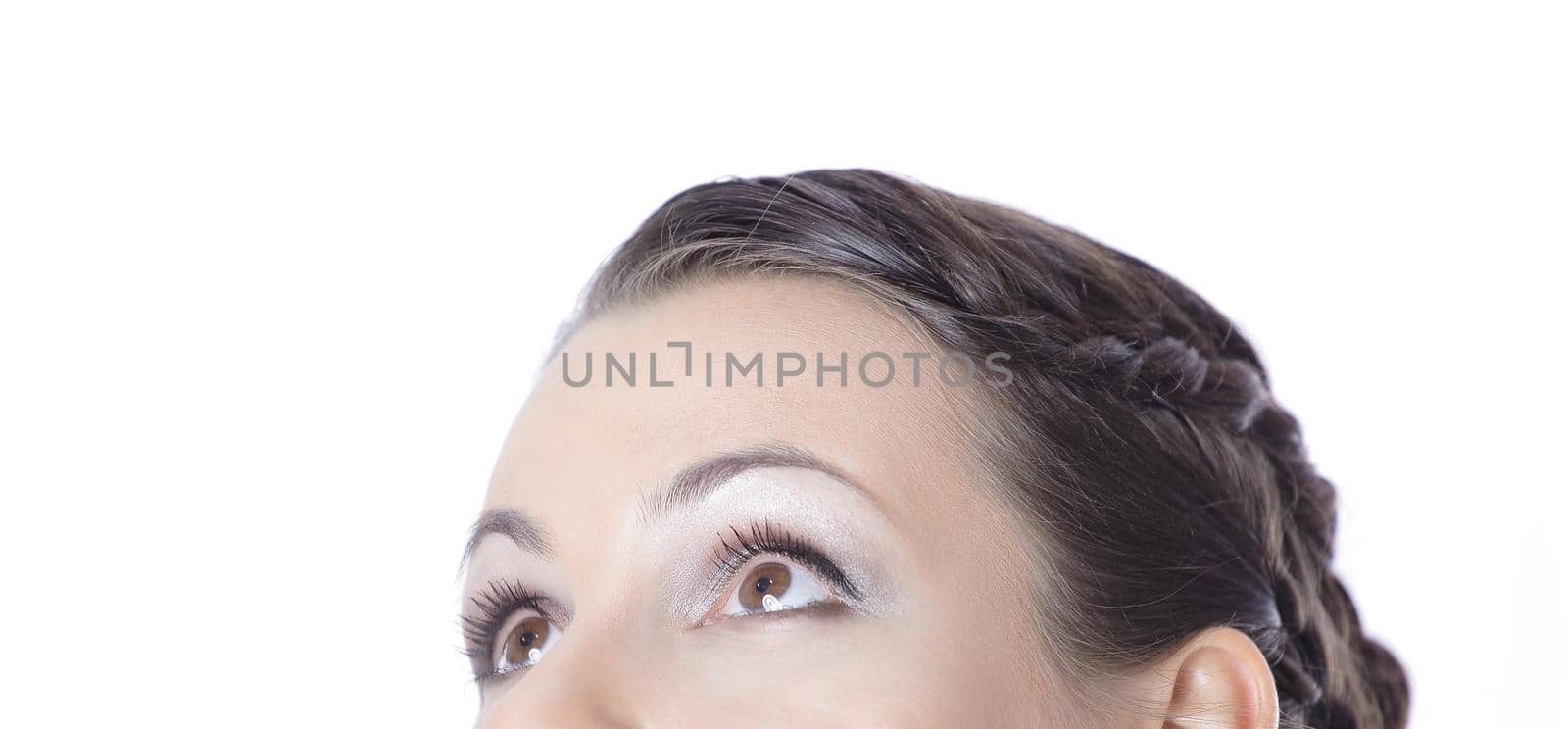 closeup.beautiful modern girl looking up at copy space by SmartPhotoLab