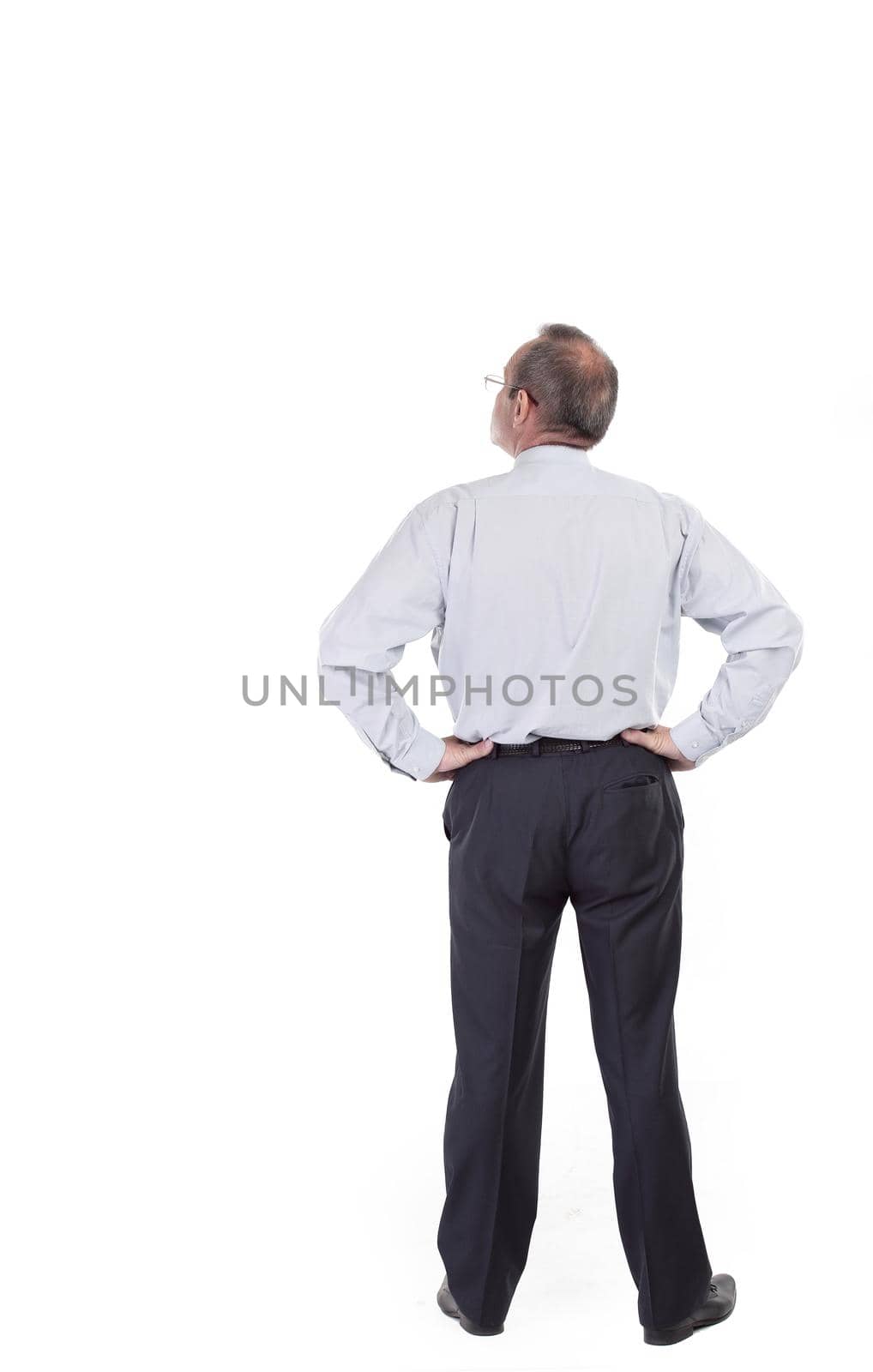 rear view. businessman looking at copy space by SmartPhotoLab