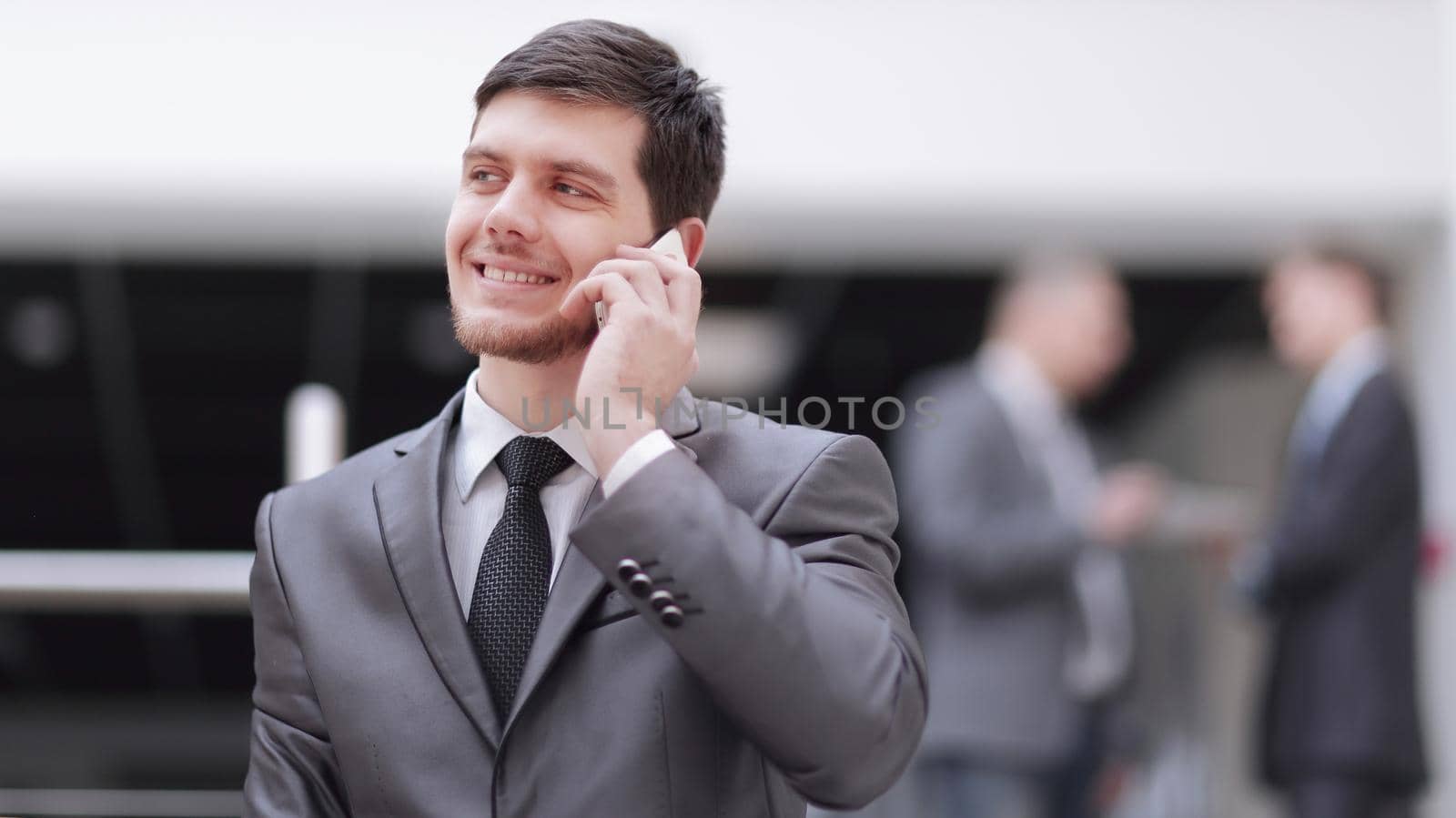 portrait of handsome businessman on blurred office background.photo with copy space