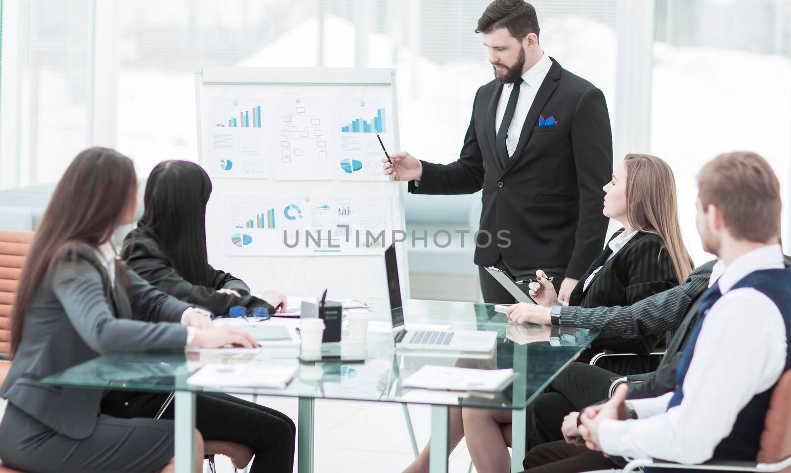 senior Manager of the company makes the presentation of a new financial project for the company's employees. the photo has a empty space for your text.