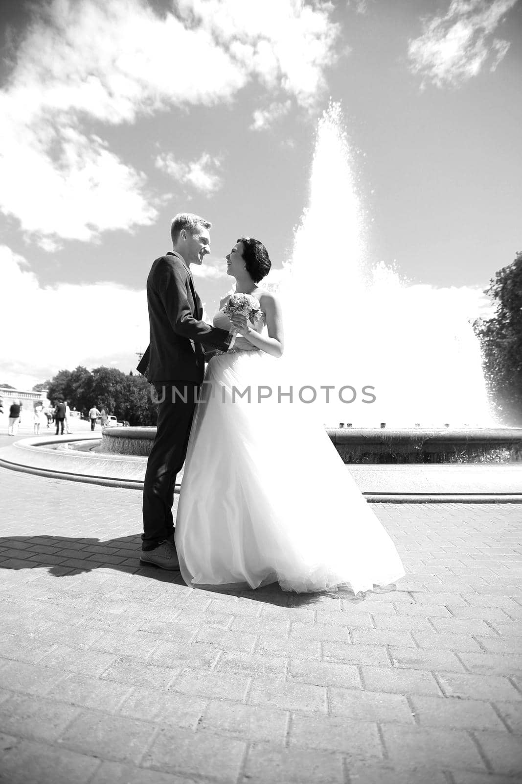 photo in retro style . happy bride and groom on the background of the city