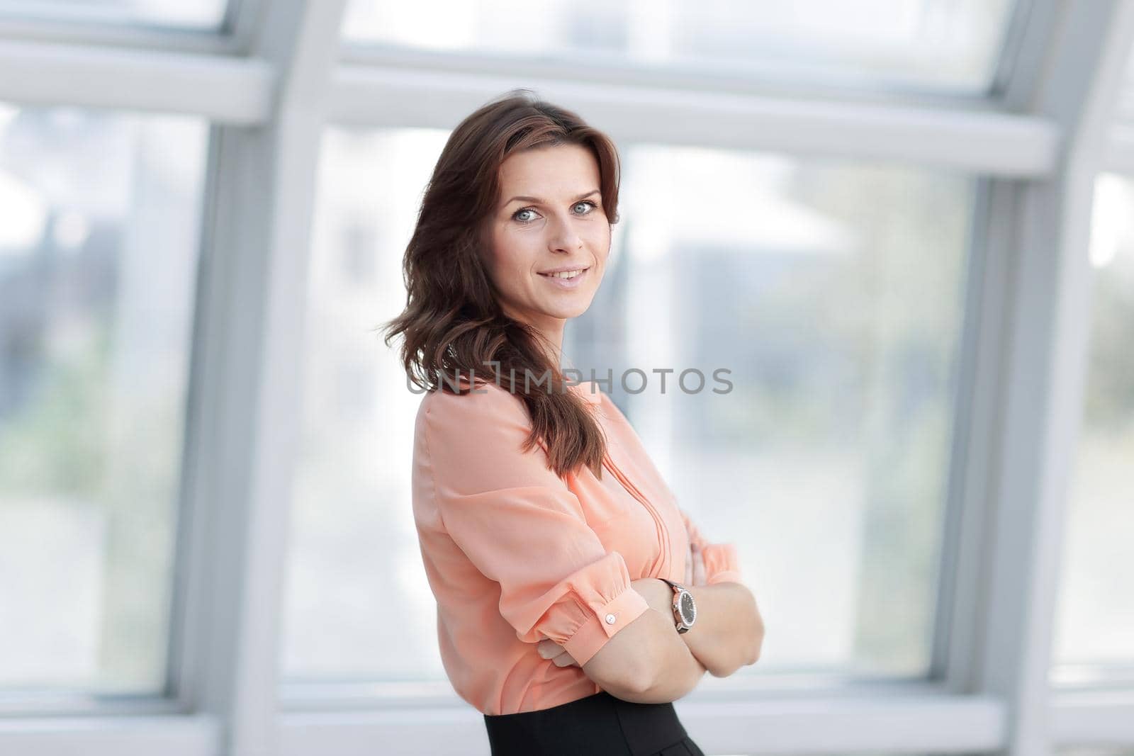 close up.portrait of modern young woman on blurred office background.photo with copy space.