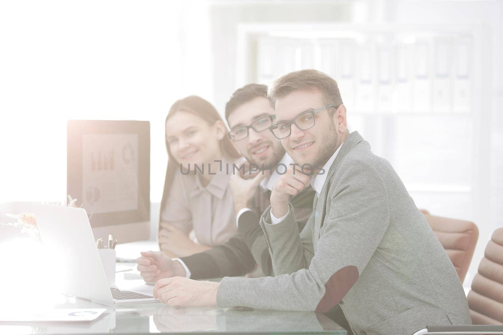 successful business team sitting at the Desk .photo with copy space.