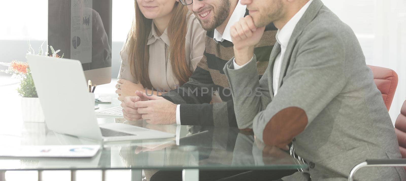 successful business team sitting at the Desk .photo with copy space.