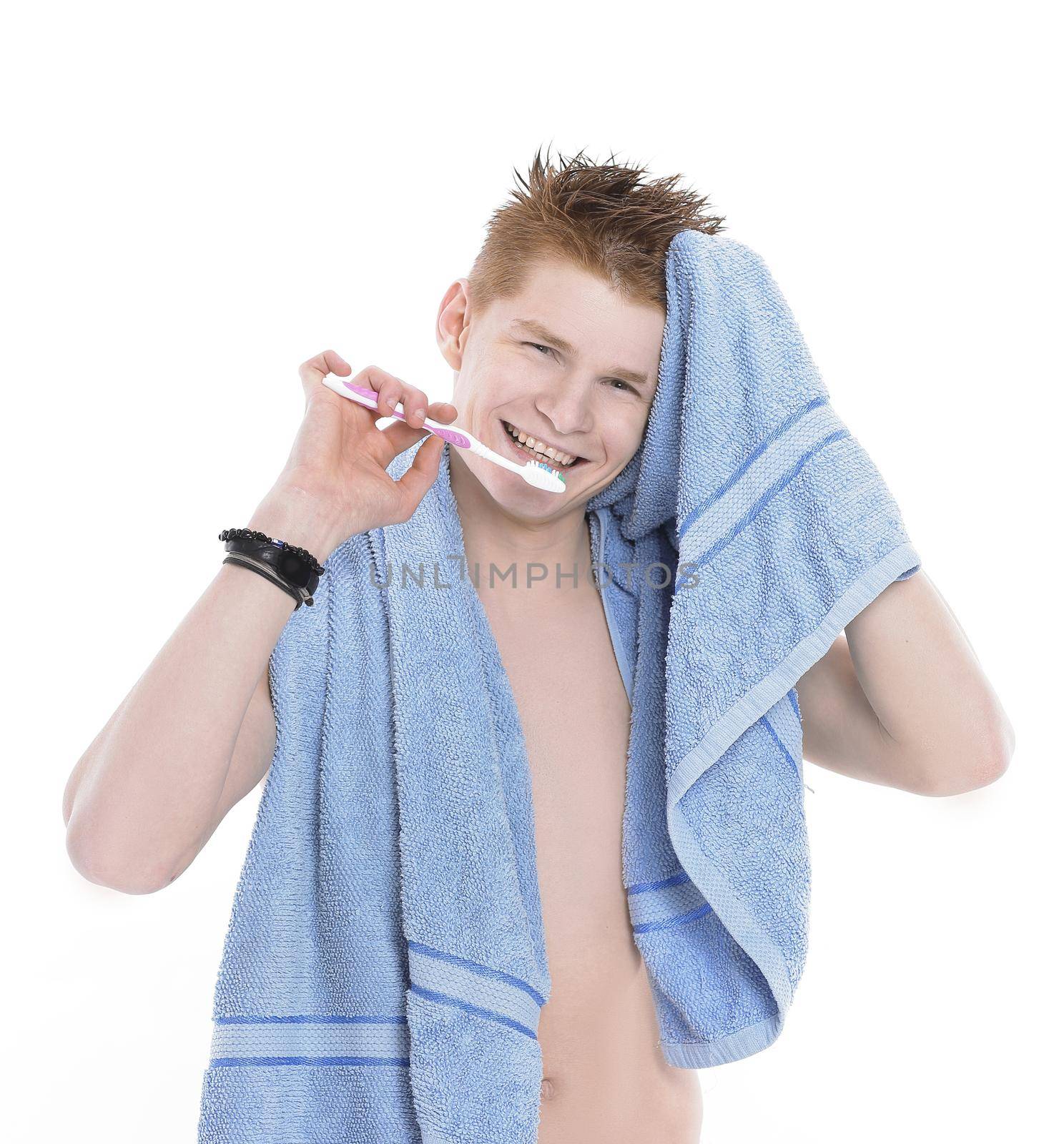 young man with towel and toothbrush.isolated on white background